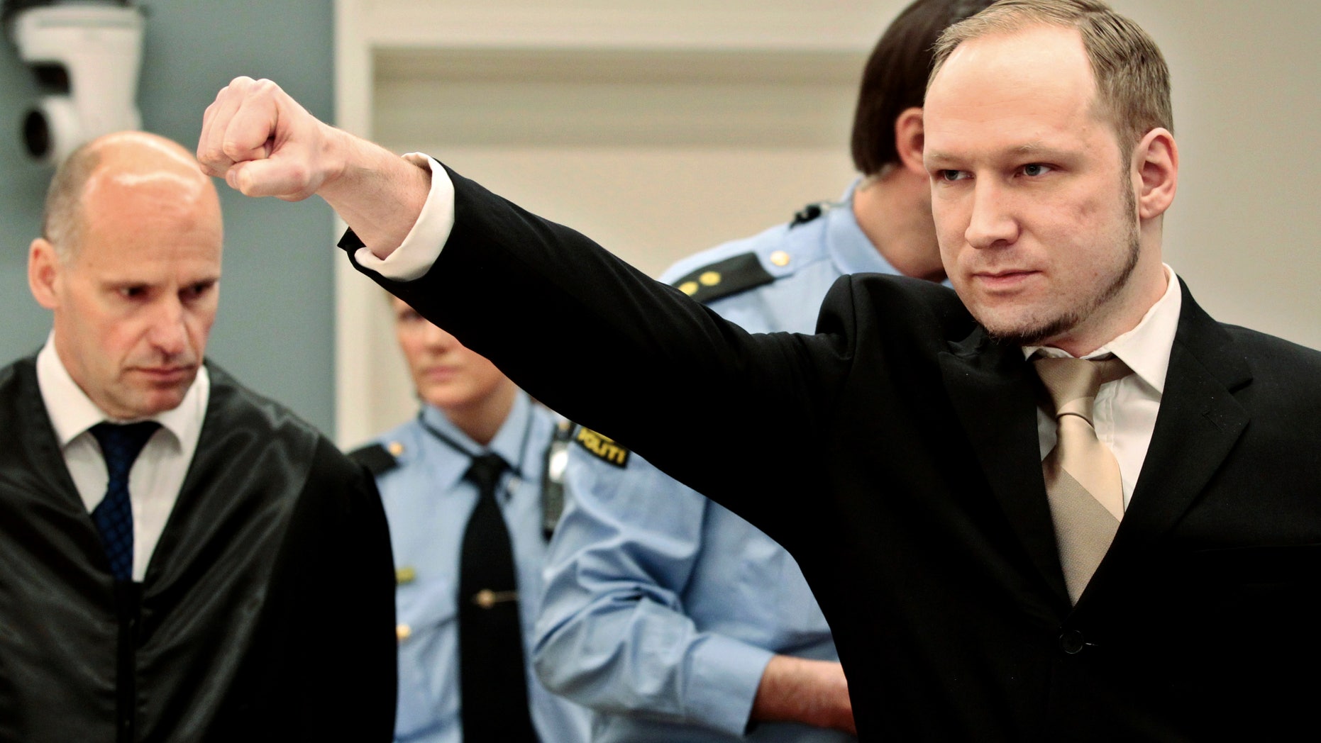 April 16, 2012: File photo of accused Norwegian Anders Behring Breivik as he gestures as he arrives at the courtroom in Oslo, Norway.