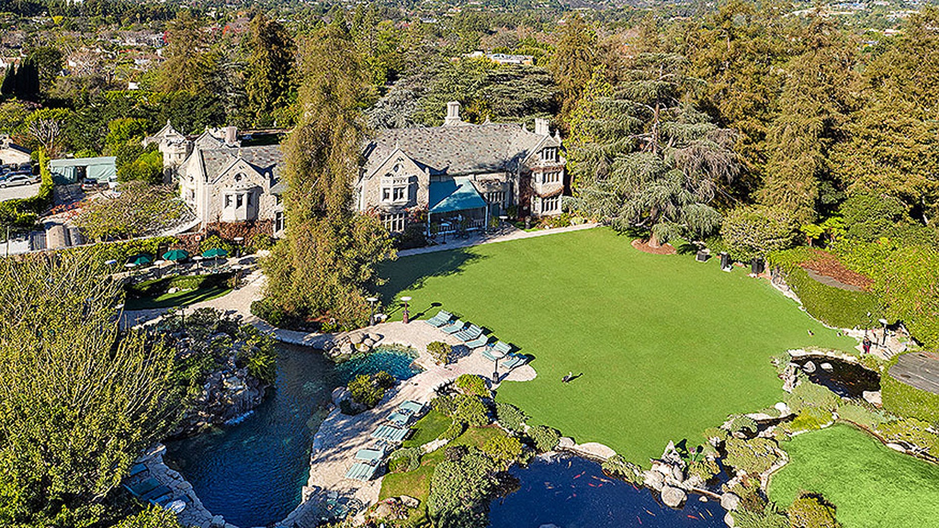 The property is directly across the street from the famed, former Playboy Mansion.