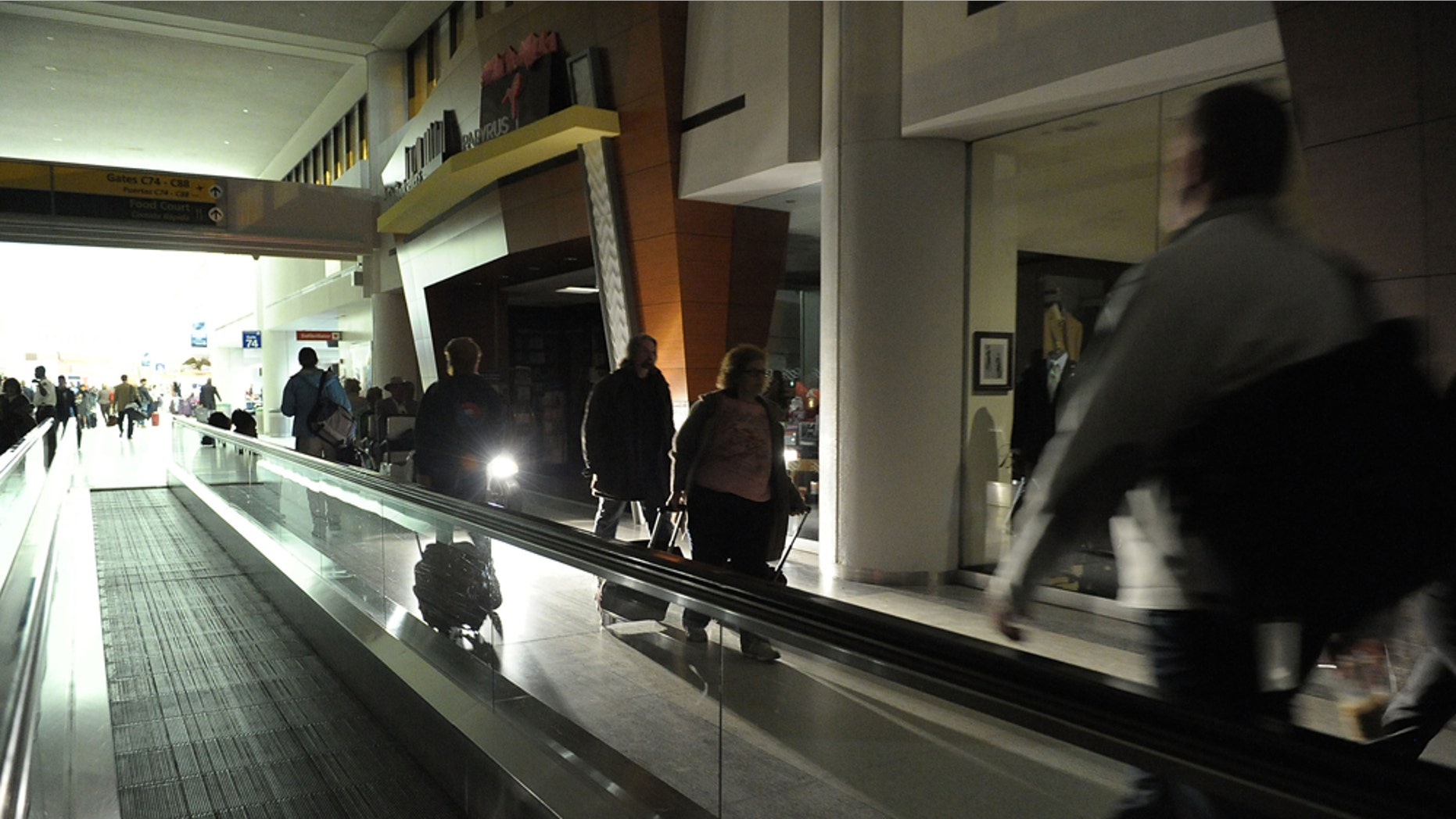 FEBRUARY 07: Passengers walk through Newark Airport on February 7, 2011 in Newark, New Jersey. (Photo by Michael Loccisano/Getty Images)