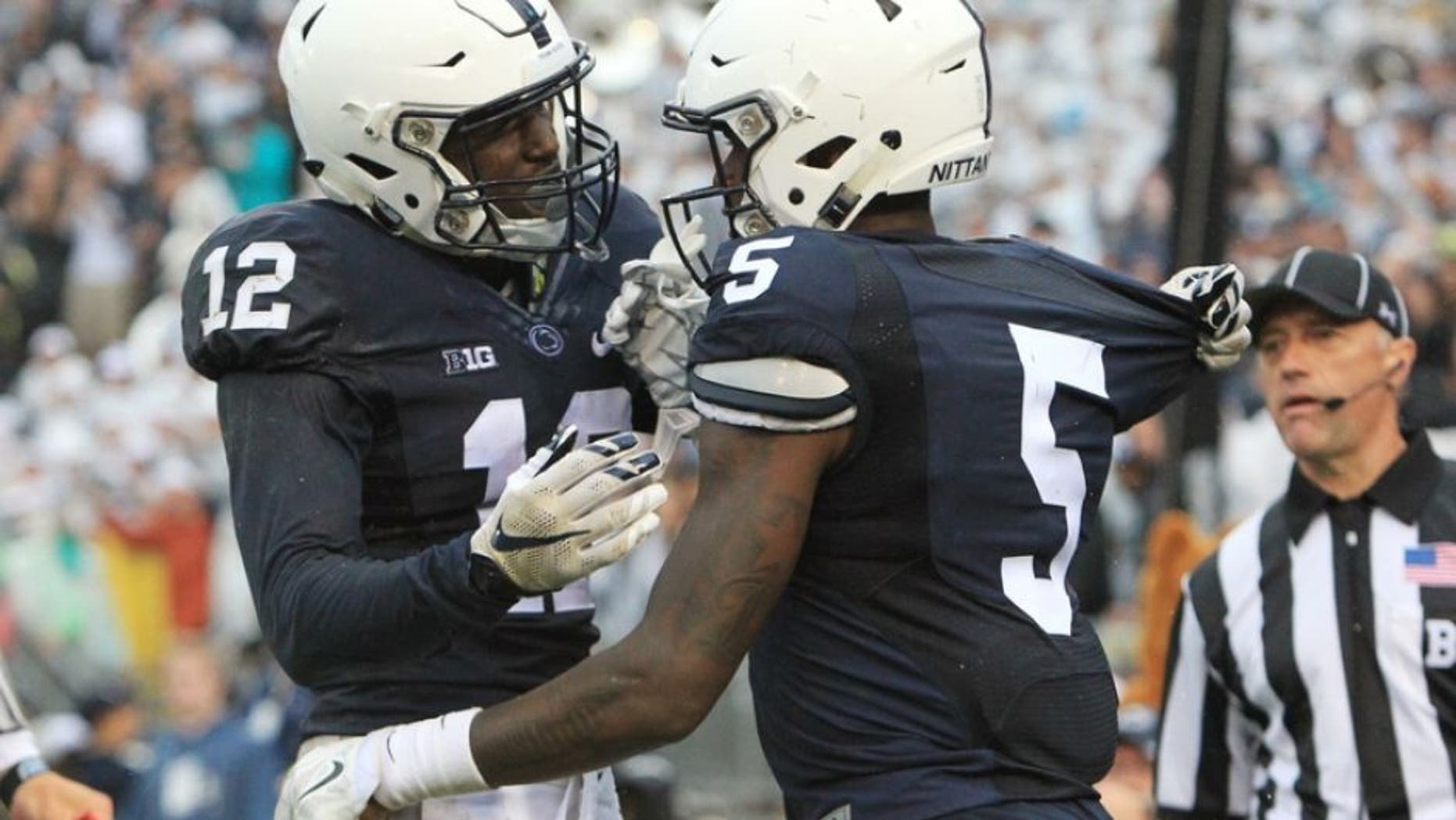 Sep 12, 2015; University Park, PA, USA; Penn State Nittany Lions wide receiver DaeSean Hamilton (5) celebrates with wide receiver Chris Godwin (12) after scoring a touchdown during the fourth quarter against the Buffalo Bulls at Beaver Stadium. Penn State defeated Buffalo 27-14. Mandatory Credit: Matthew O'Haren-USA TODAY Sports