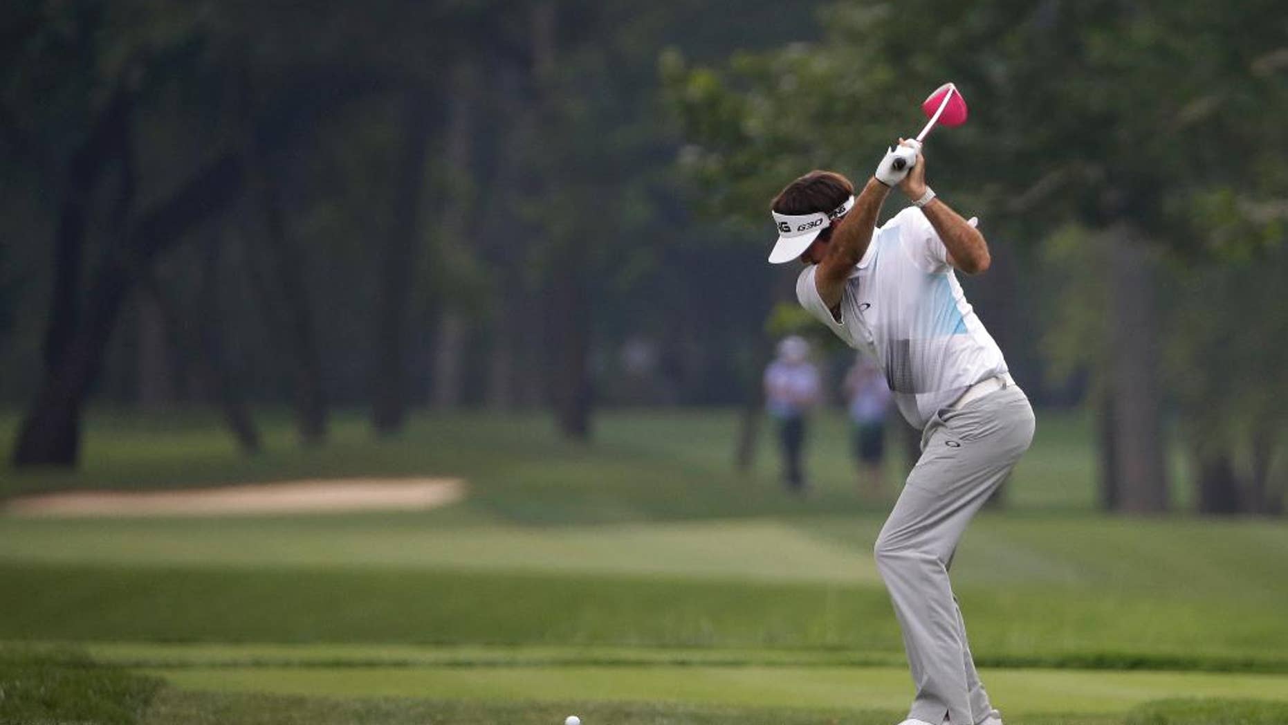 Bubba Watson hits his tee shot on the 15th hole during a practice round for the PGA Championship golf tournament at Valhalla Golf Club on Tuesday, Aug. 5, 2014, in Louisville, Ky. The tournament is set to begin on Thursday. (AP Photo/David J. Phillip)