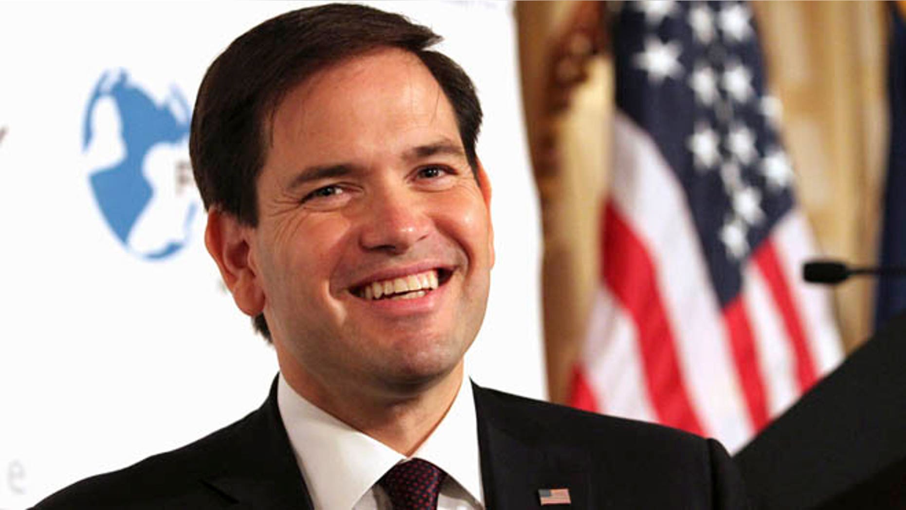 In this Friday, Aug. 14, 2015, photo, Republican presidential candidate, Sen. Marco Rubio, R-Fla. smiles while speaking during an event hosted by the Foreign Policy Initiative in New York. Rubioâs slow-go campaign strategy is puzzling party operatives in Iowa and New Hampshire, states where voters are used to candidates showering them with attention early and often. (AP Photo/Tina Fineberg)
