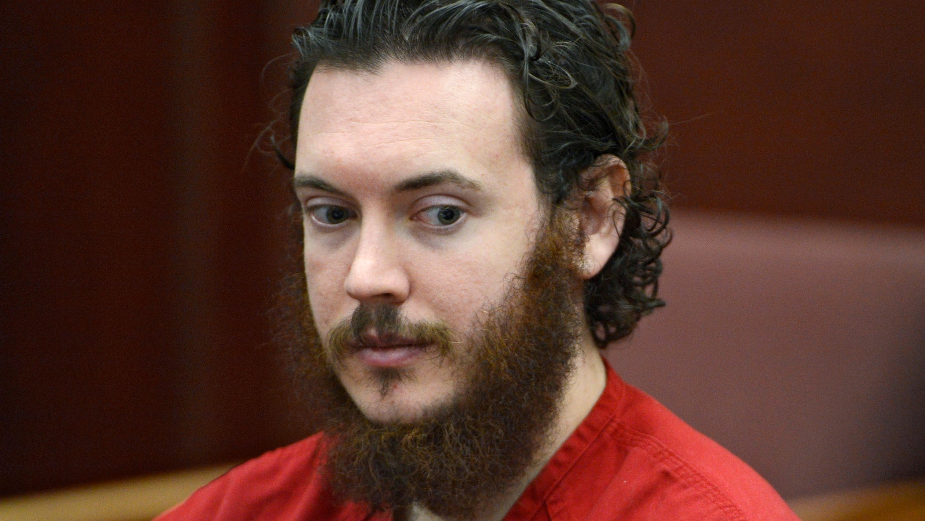 FILE -This June 4, 2013 file photo shows Aurora theater shooting suspect James Holmes in court in Centennial, Colo. Holmes is returning to court Monday Oct. 21, 2013 for another round of legal skirmishes over what evidence can be used against him when he goes on trial for the Colorado theater shootings. (AP Photo/The Denver Post, Andy Cross, Pool, File)
