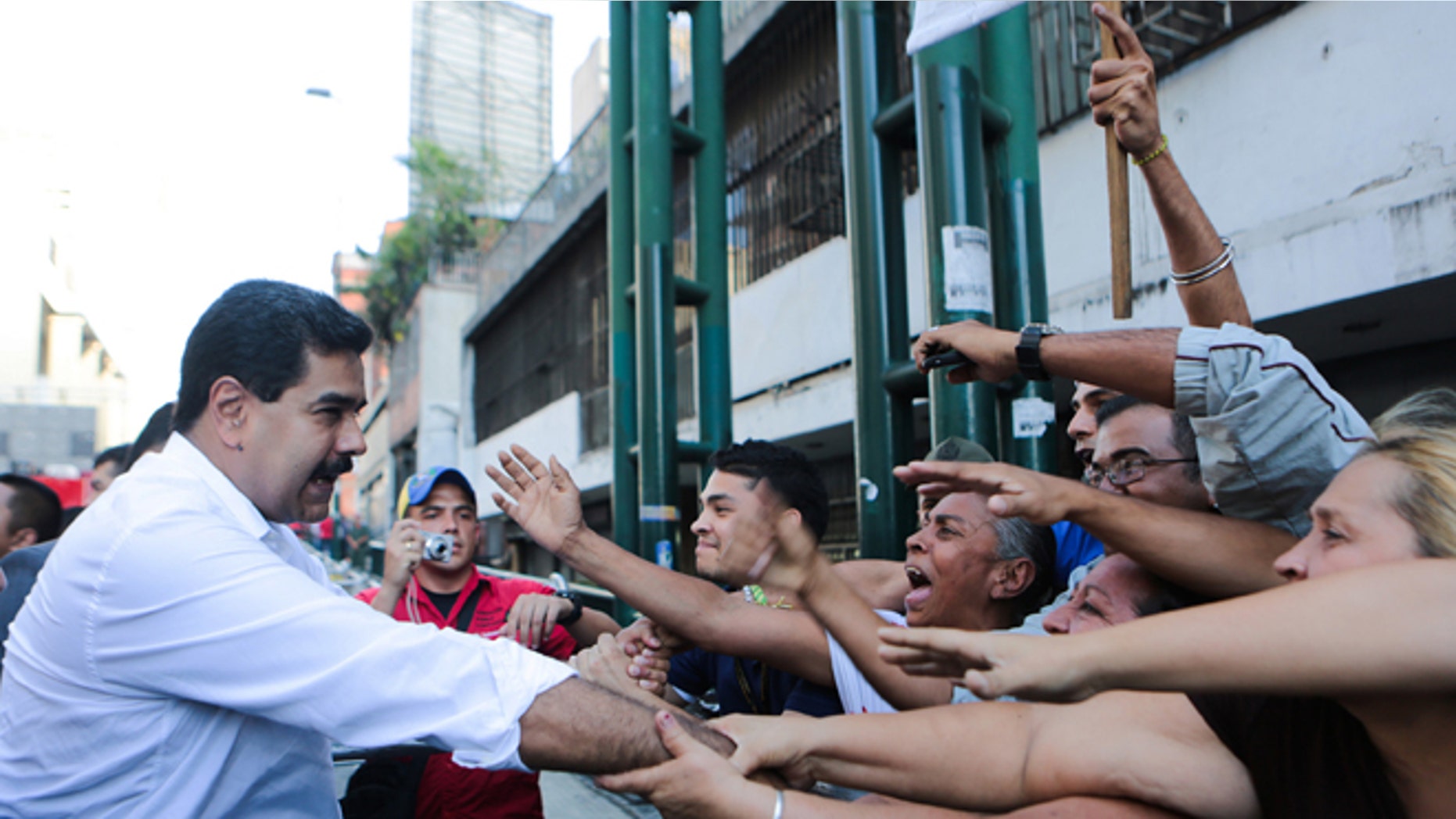 President Maduro during a transport workers rally in Caracas, Venezuela, Tuesday, Nov. 12, 2013.