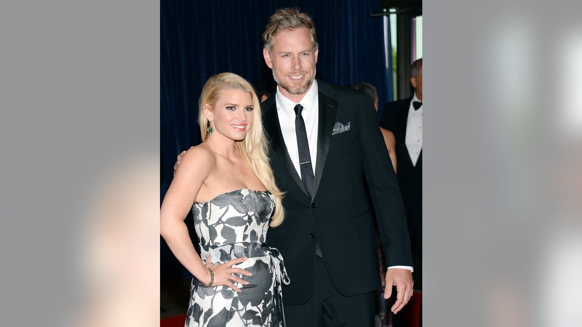 May 3, 2014. Jessica Simpson and Eric Johnson attend the White House Correspondents Association Dinner at the Washington Hilton Hotel in Washington.