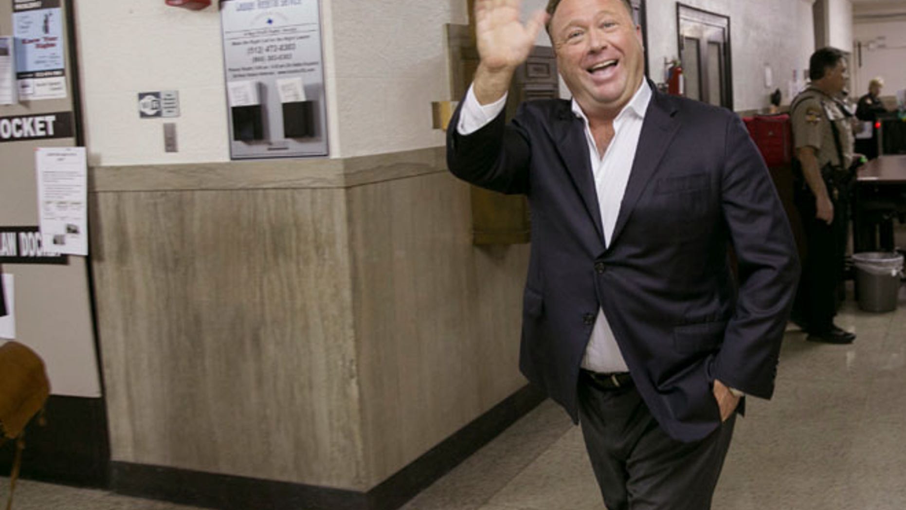April 19: Alex Jones, a well-known Austin-based broadcaster and provocateur, arrives for a child custody trial at the Heman Marion Sweatt Travis County Courthouse in Austin, Texas.