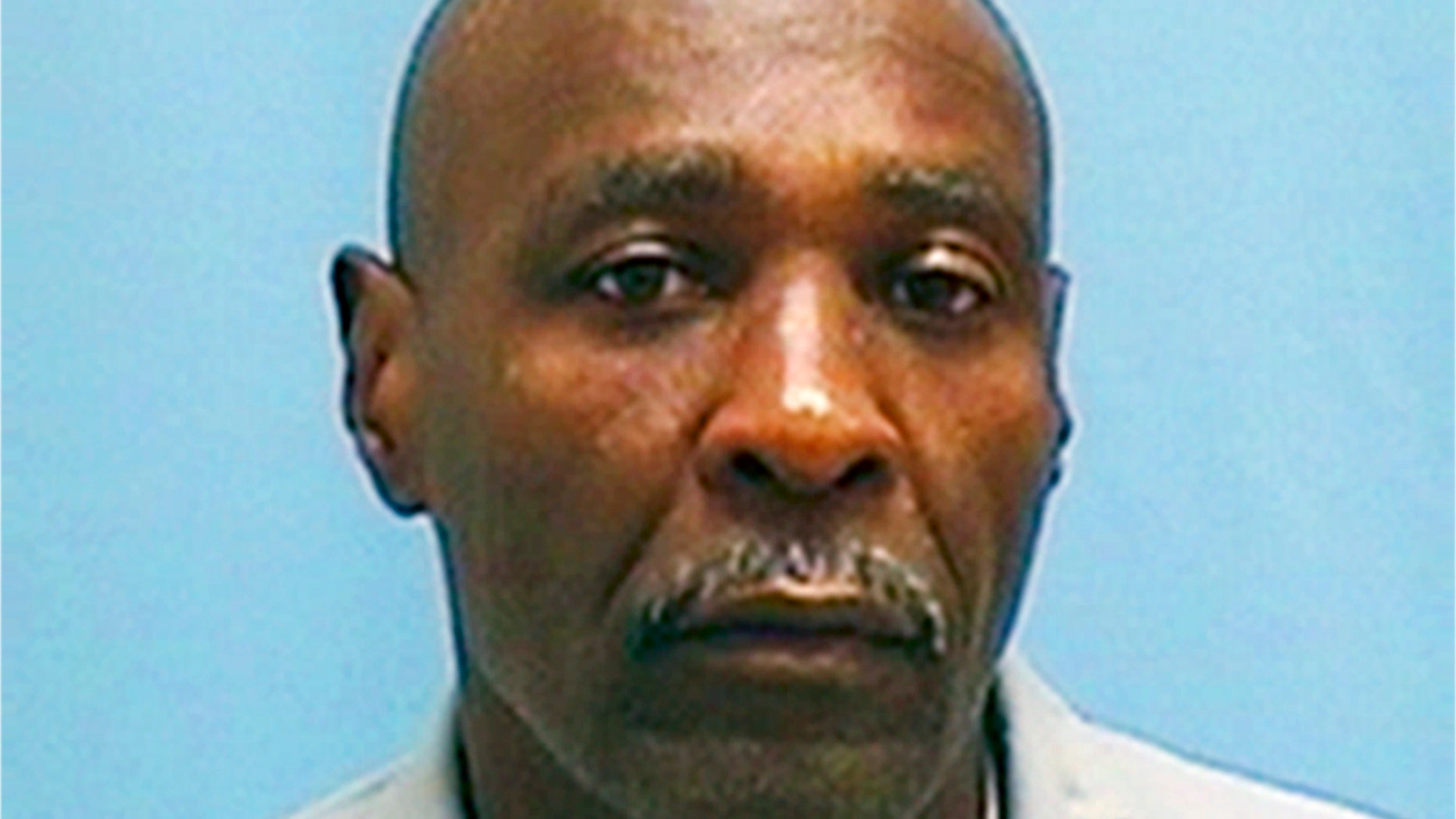 FILE - This undated file photo provided by the Illinois Department of Corrections shows inmate Stanley Wrice. On Tuesday, Dec. 10, 2013, a Cook County judge overturned the rape conviction for Wrice who has been in prison for 30 years. He will be released from Pontiac Correctional Center on Wednesday. The ruling comes two days after key witness Bobby Joe Williams testified detectives working for former Chicago police lieutenant Jon Burge tortured him into falsely testifying against Wrice. (AP Photo/Illinois Department of Corrections)