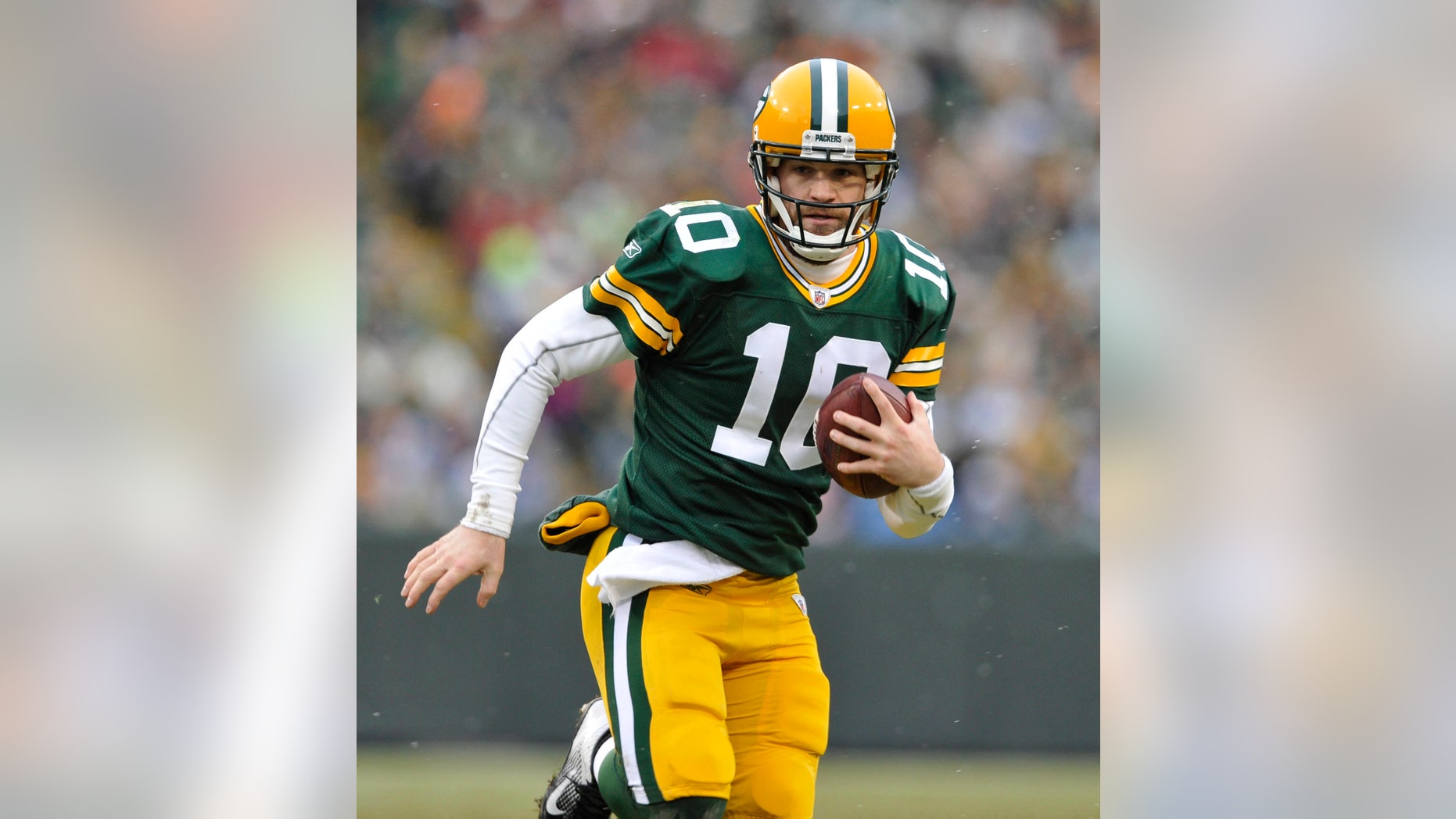 In this Jan. 1, 2012, photo, Green Bay Packers' Matt Flynn scrambles during an NFL football game against the Detroit Lions in Green Bay, Wis. With quarterback Aaron Rodgers hurt, Flynn will back up one-time practice squad player Scott Tolzien, who replaced Seneca Wallace in the 27-13 loss Sunday, Nov. 10, to the Eagles. (AP Photo/Mike Roemer)