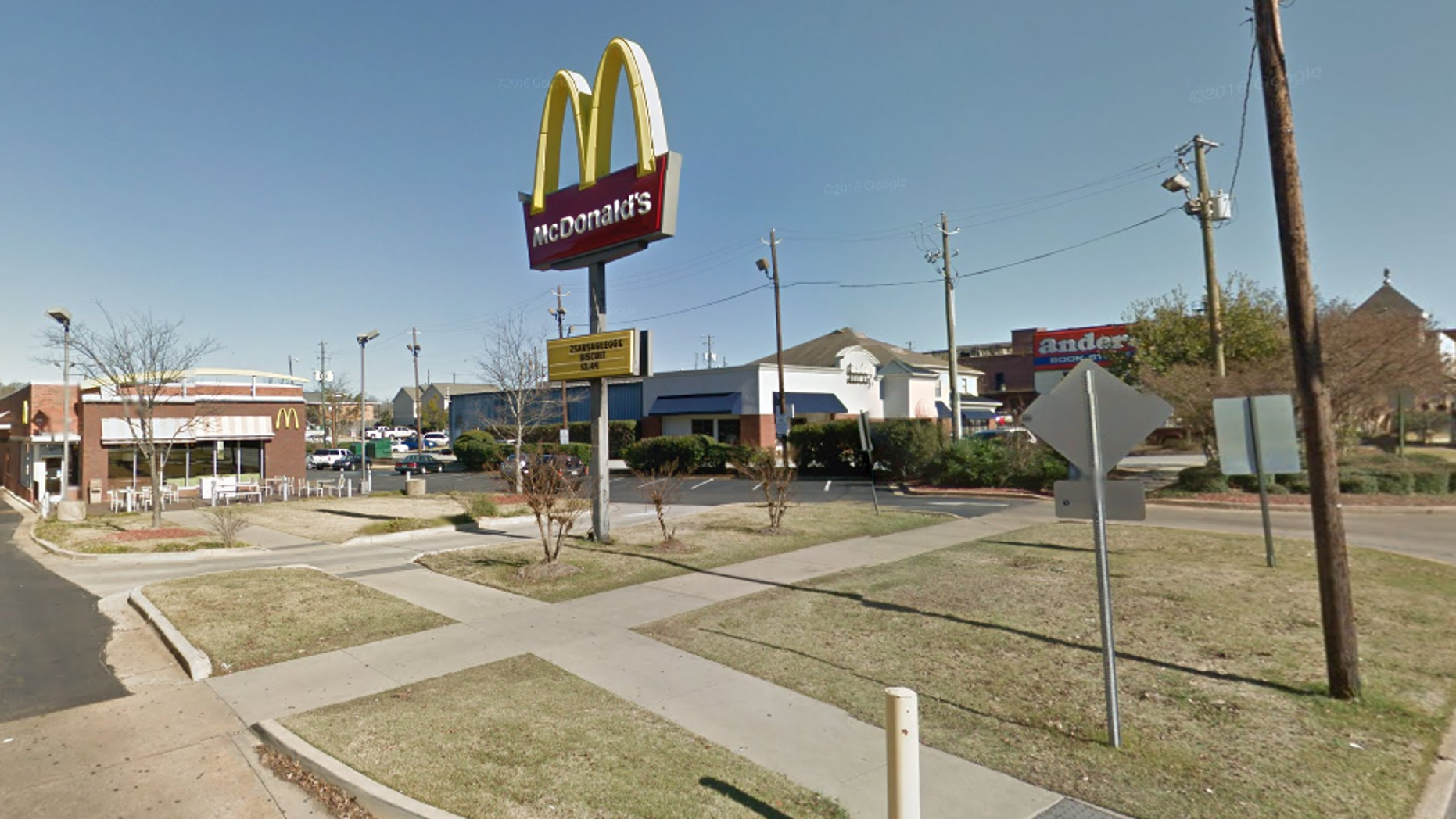 A man was killed and four others were wounded after shots were fired at a McDonald's near Auburn University, police said.