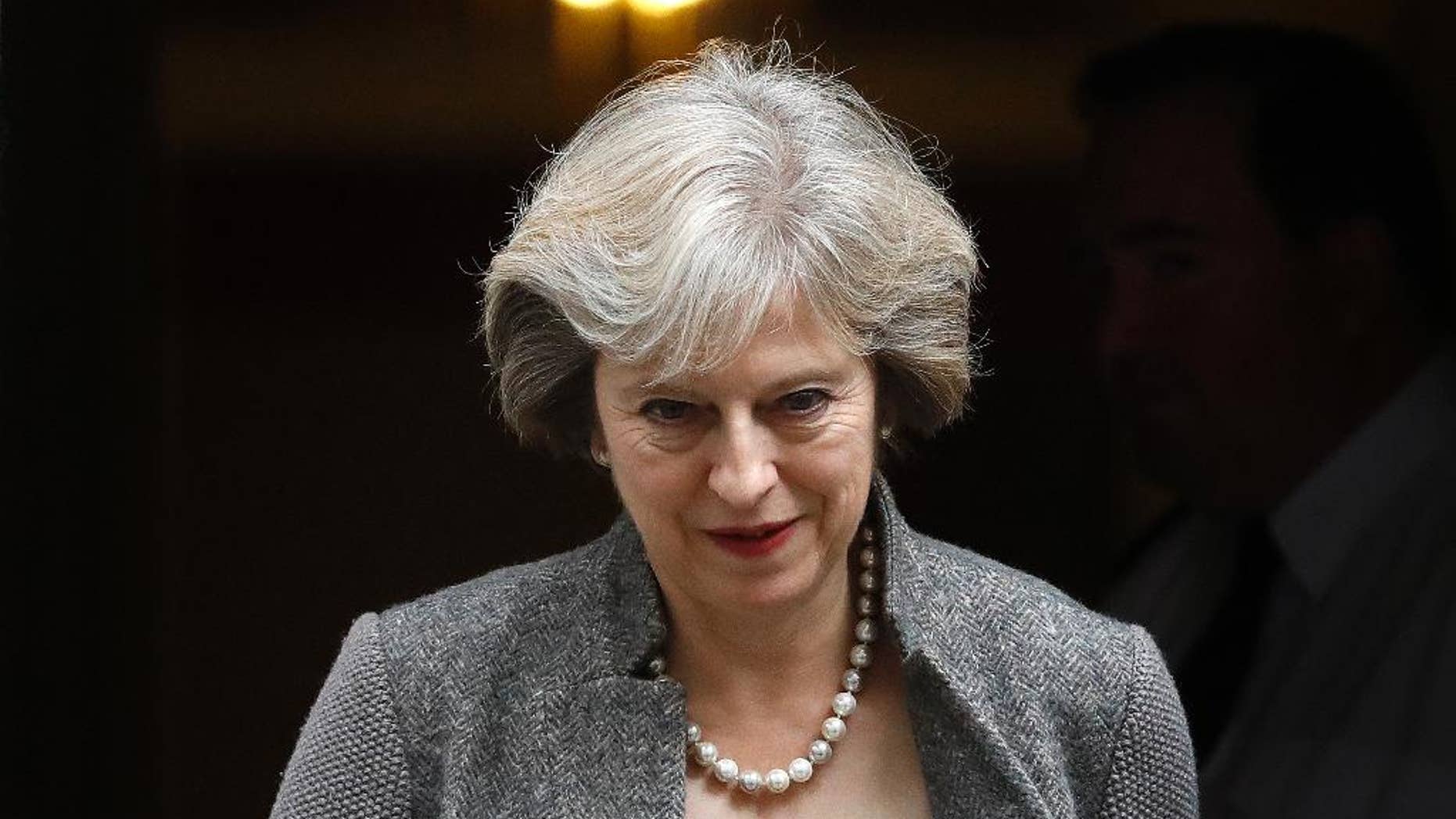 Britain's Prime Minister Theresa May leaves 10 Downing Street in London, Monday, Sept. 26, 2016. (AP Photo/Frank Augstein)