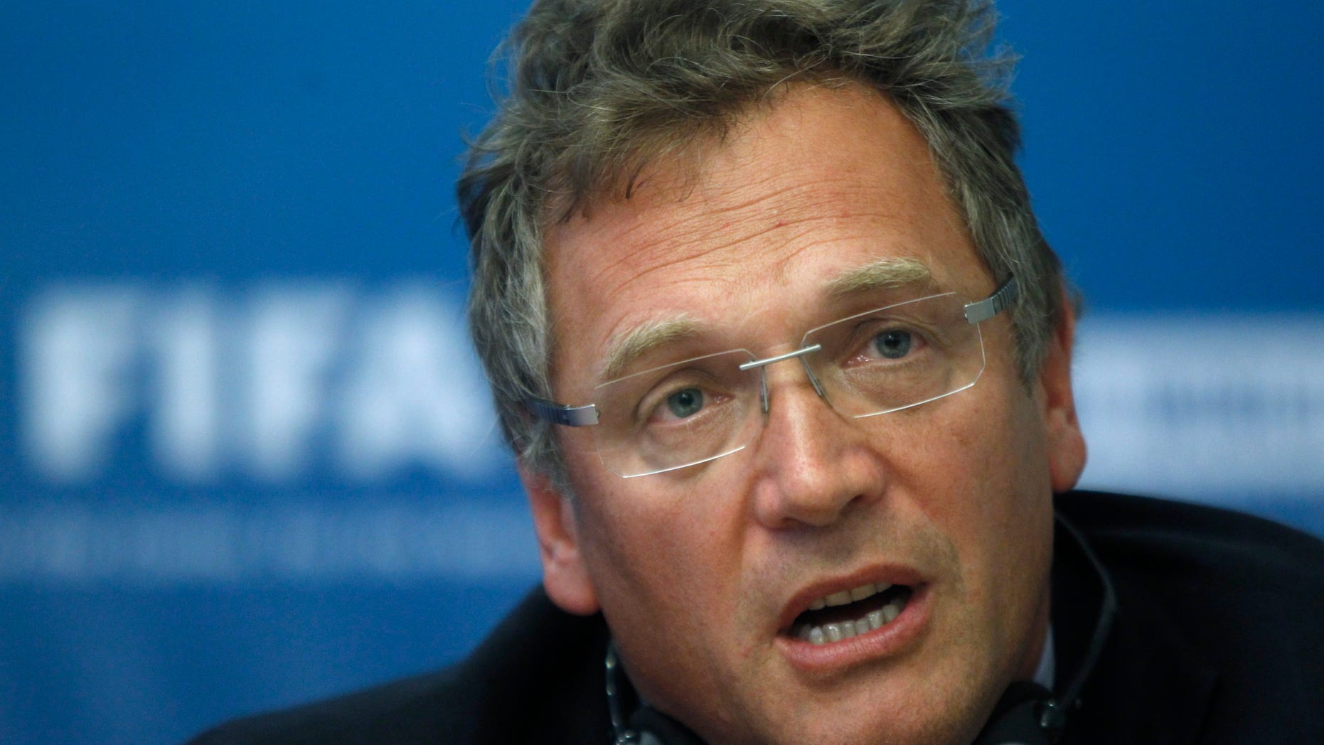FILE - In this Tuesday, Oct. 11, 2011 file photo, FIFA General Secretary Jerome Valcke speaks during a news conference on Russia's preparations for the 2018 FIFA World Cup in Moscow, Russia. Valcke says the 2022 World Cup in Qatar will not be held in June or July because of the Gulf country's summer heat. (AP Photo/Mikhail Metzel, File)