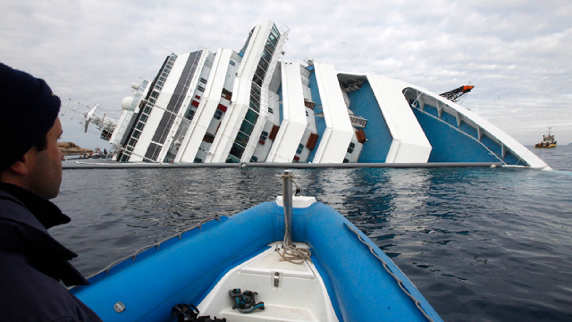 Jan. 27: Italian firefighters approach the grounded cruise ship Costa Concordia off the Tuscan island of Giglio, Italy.