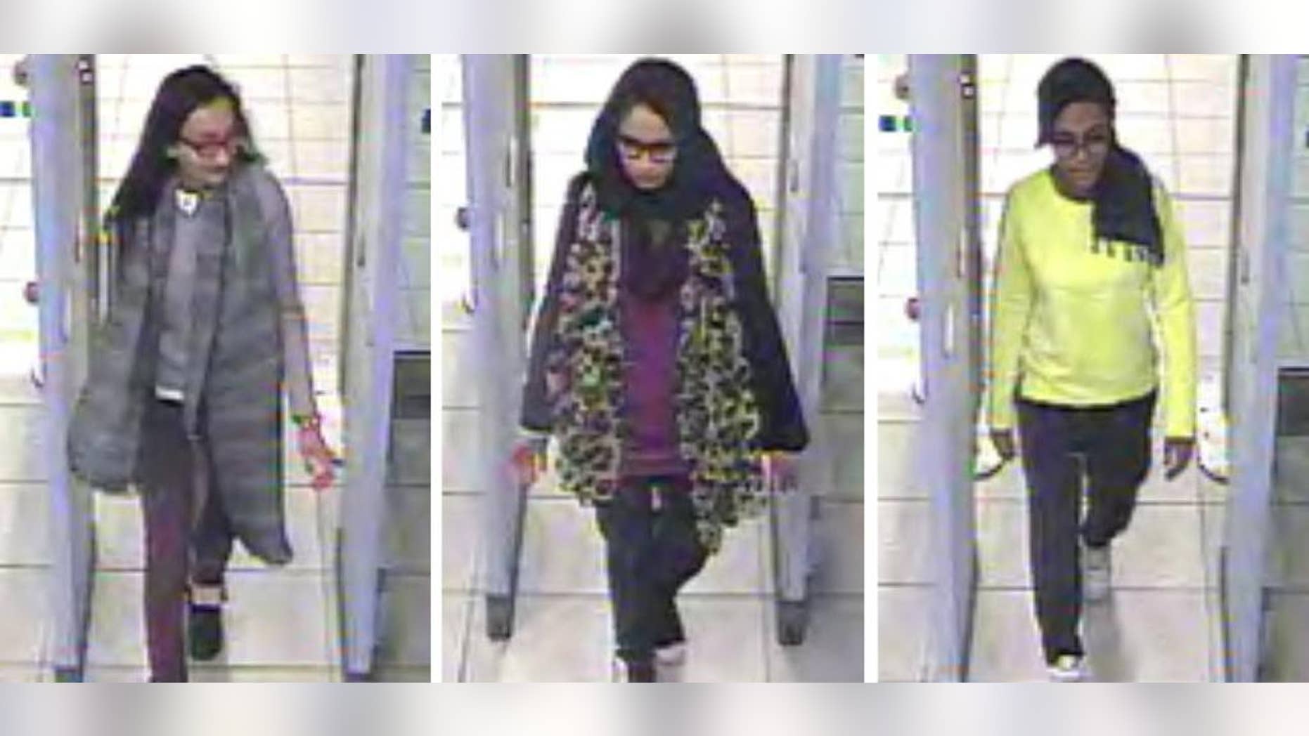 FILE - This is a Monday Feb. 23, 2015 file handout image of a three image combo of stills taken from CCTV issued by the Metropolitan Police Kadiza Sultana, left, Shamima Begum, centre and and Amira Abase going through security at Gatwick airport, before they caught their flight to Turkey. A lawyer said one of three London schoolgirls who traveled to Islamic State-controlled area of Syria to become "jihadi brides" is believed to have been killed in an air strike. Tasnime Akunjee told the BBC Friday Aug. 12, 2016 that Kadiza Sultana's family had been told that she died in the IS stronghold of Raqqa several weeks ago. (Metropolitan Police via AP)