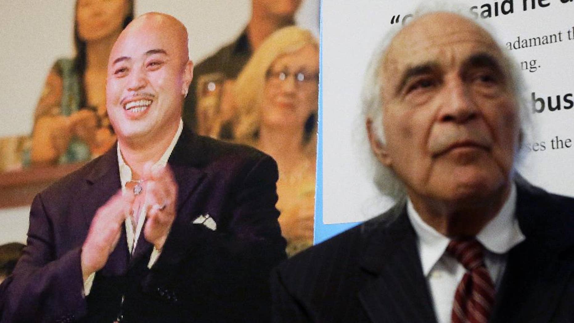 FILE - In this April 10, 2014 file photo, Tony Serra, right, an attorney for Raymond "Shrimp Boy" Chow, pictured at left, listens to speakers at a news conference in San Francisco. Chow, a dapper former San Francisco gang leader who portrayed himself as a reformed criminal, was the focus of a lengthy organized crime investigation in Chinatown that ended up snaring a corrupt California senator and more than two dozen others. Closing arguments are expected Monday, Jan. 4, 2016, in the racketeering and murder case against Chow. (AP Photo/Jeff Chiu, File)
