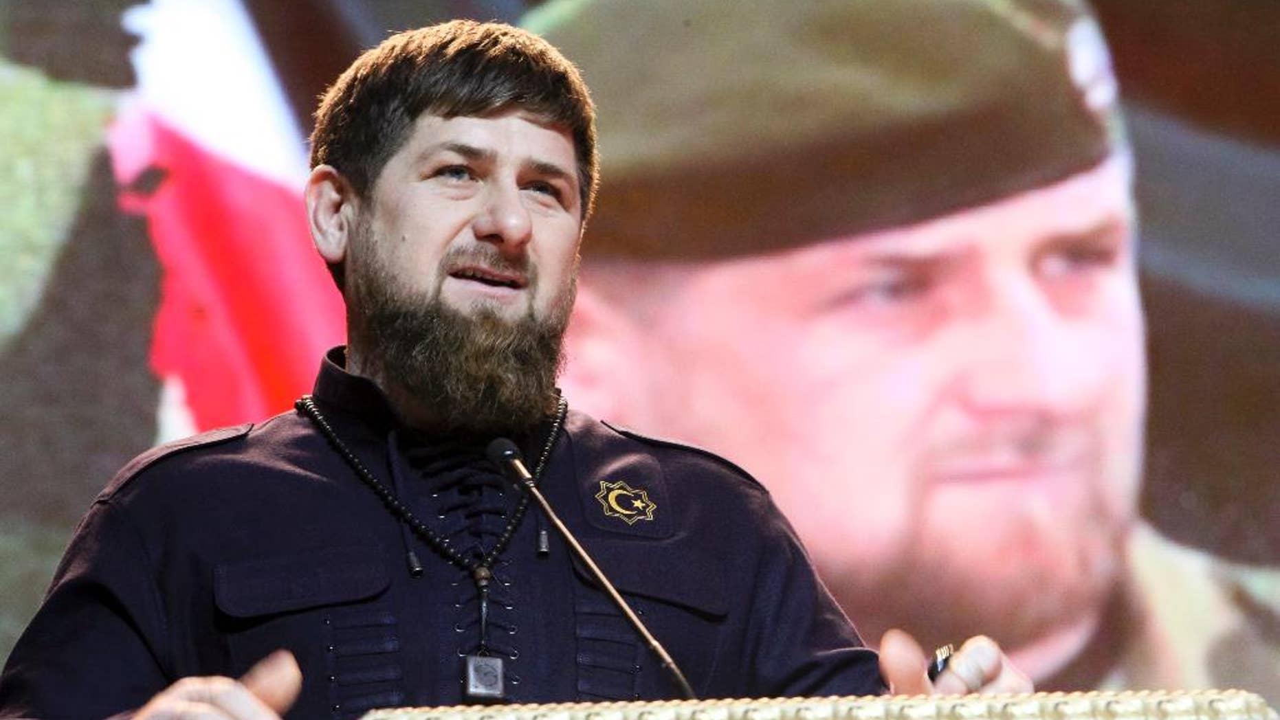 FILE - In this file photo taken Saturday, Feb. 20, 2016, Chechen regional leader Ramzan Kadyrov speaks as he attends celebrations marking Defenders of the Fatherland Day in Chechnya's provincial capital Grozny, Russia. The Kremlin-backed strongman leader of Chechnya says he will seek another term in office. (AP Photo/Musa Sadulayev, File)