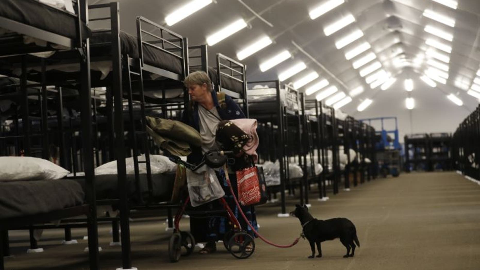 The first of three shelters opened Friday in San Diego, as the city struggles to control a homeless crisis.