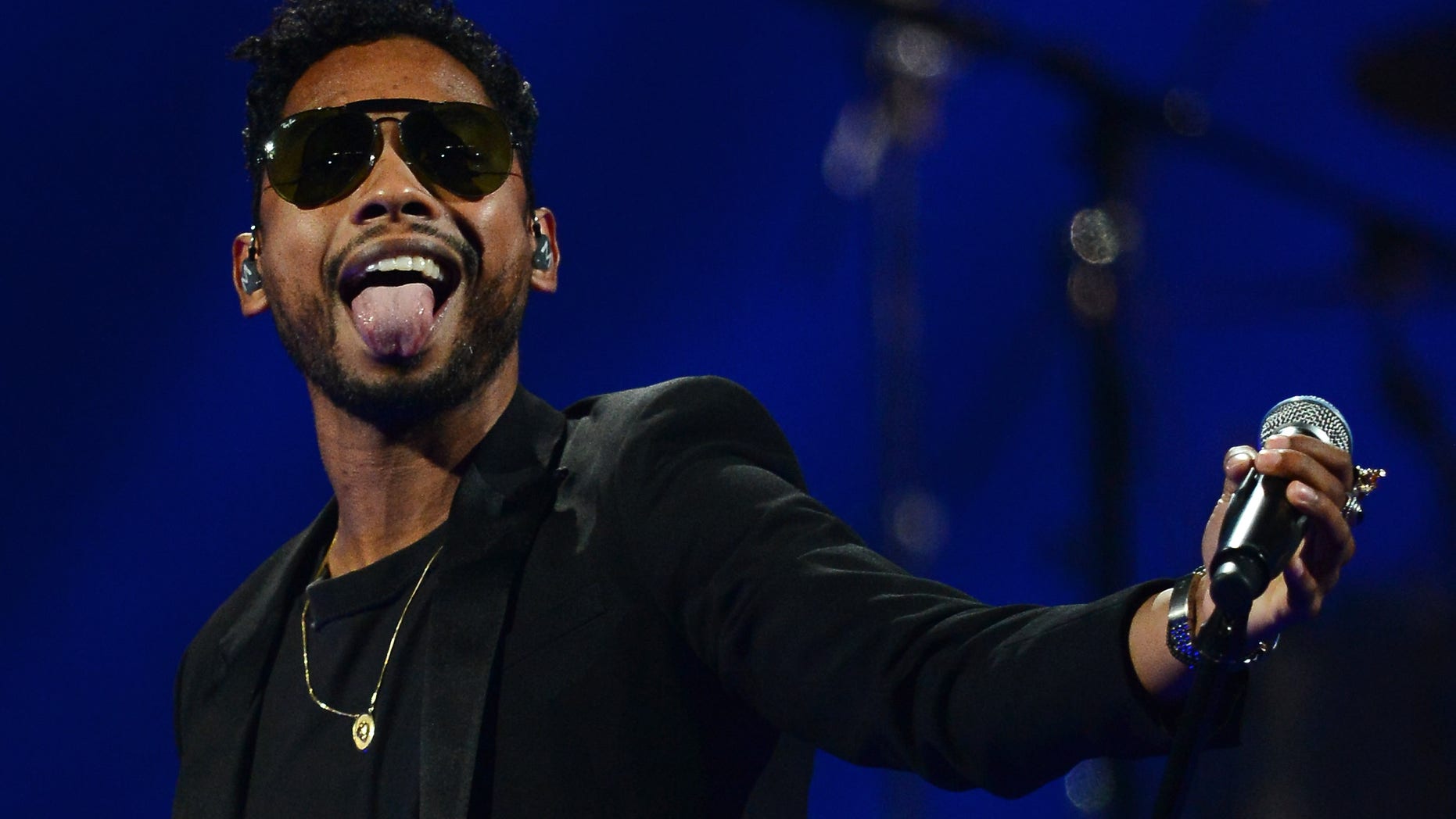 LAS VEGAS, NV - SEPTEMBER 21: Singer Miguel performs during the iHeartRadio Music Festival at the MGM Grand Garden Arena on September 21, 2013 in Las Vegas, Nevada. (Photo by Ethan Miller/Getty Images for Clear Channel)