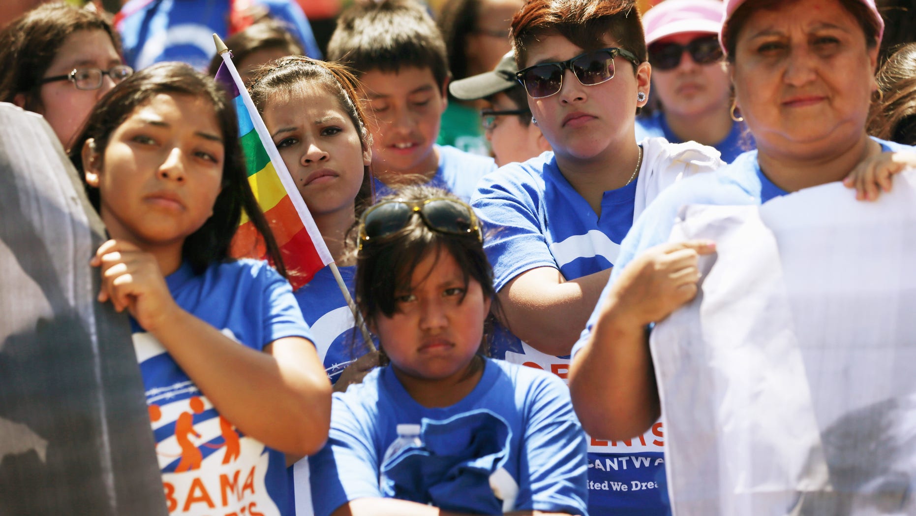 WASHINGTON, DC - JULY 28: United We Dream activists participate in a rally in front of the White House July 28, 2014 in Washington, DC. The activists urged President Obama not to deport the parents of DREAMers, children who brought illegally to the U.S. and eligible for the Obama Administrations "Dream Act" initiative . (Photo by Alex Wong/Getty Images)