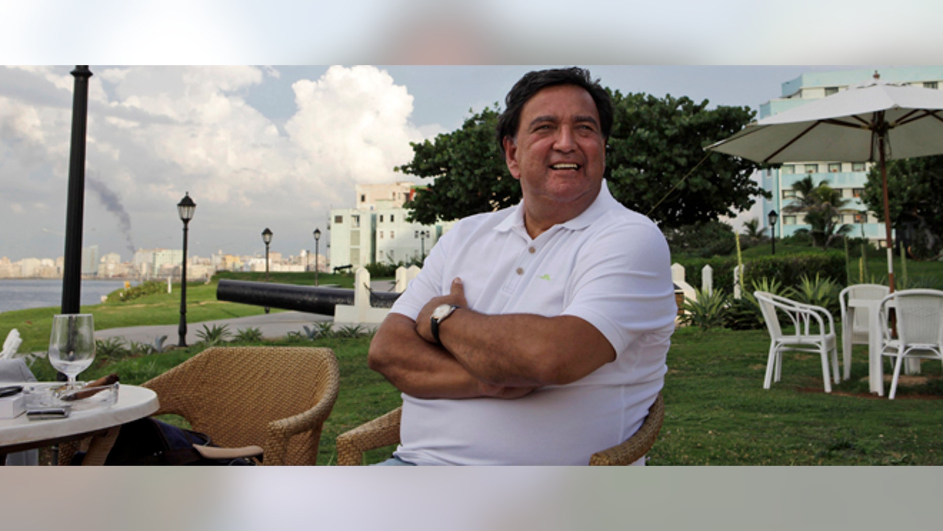 Former New Mexico Gov. Bill Richardson smiles as he sits at an area outside a bar in the National hotel in Havana, Cuba, Wednesday, Sept. 7, 2011. Richardson arrived in Cuba on Wednesday to seek the freedom of a U.S. government subcontractor Alan Gross sentenced to 15 years in prison for bringing communications equipment to the island illegally. (AP Photo/Javier Galeano)