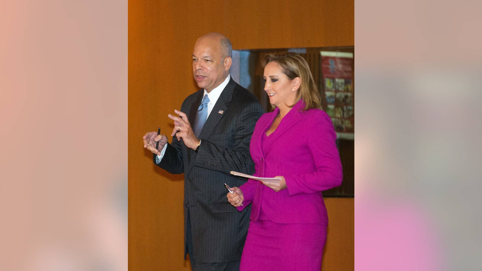 U.S. Homeland Security Secretary Jeh Johnson, left, talks to Mexico's Foreign Affairs Minister Claudia Ruiz Massieu, in Mexico City, Tuesday, Oct. 11, 2016. Johnson said during his visit to Mexico City, some flights to Haiti have been suspended due to Hurricane Matthew. He said Tuesday that U.S. officials will have to "be sympathetic to the plight of the people of Haiti as a result." But after conditions change, "we intend to resume the policy." (AP Photo/Eduardo Verdugo) (AP Photo/Eduardo Verdugo)