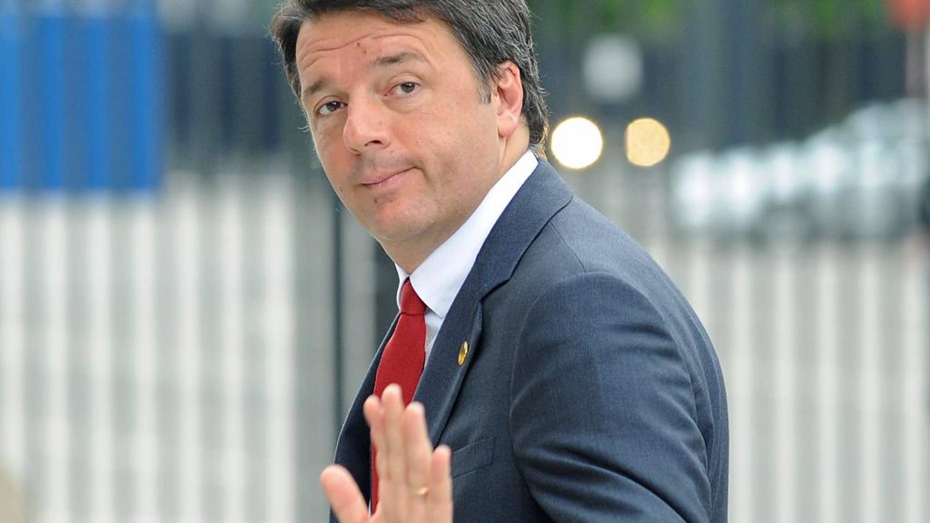 Italian Prime Minister Matteo Renzi arrives for sessions of the second day of the NATO Summit, in Warsaw, Poland, Saturday, July 9, 2016. US President Barack Obama and leaders of the 27 other NATO countries are taking decisions in Warsaw on how to deal with a resurgent Russia, violent extremist organizations like the Islamic State, attacks in cyberspace and other menaces to allies' security. (AP Photo/Alik Keplicz)