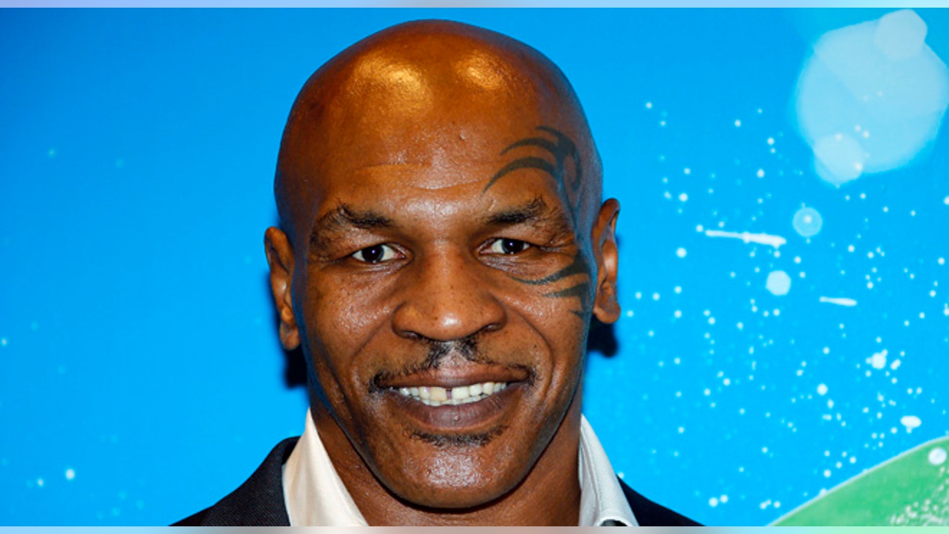 October 8, 2014. Former professional boxer Mike Tyson poses before receiving the Sportel Special Prize Autobiography for his book "Undisputed Truth: My Autobiography" during the Golden Podium Awards at the Sportel in Monte Carlo.