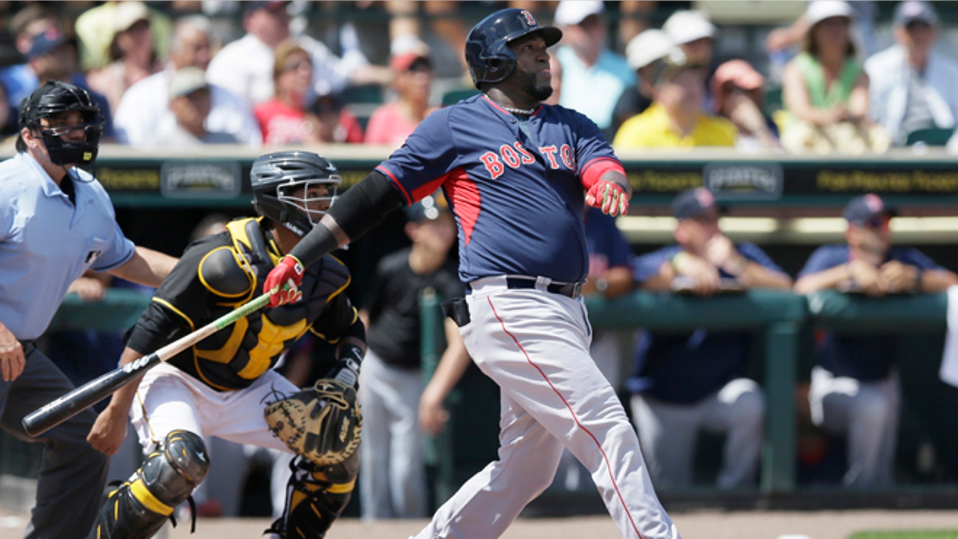Boston Red Sox designated hitter David Ortiz watches his three-run home run clear the center field wall during the third inning of a spring training exhibition baseball game against the Pittsburgh Pirates in Bradenton, Fla., Thursday, March 12, 2015. The Red Sox defeated the Pirates 5-1. (AP Photo/Carlos Osorio)