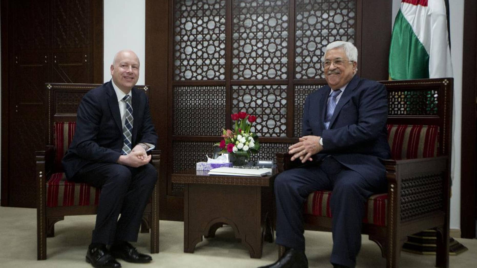 US President's peace process envoy Jason Greenblatt, left, meets with Palestinian President Mahmoud Abbas at the President's office in the West Bank city of Ramallah, Tuesday, March 14, 2017. (AP Photo/Majdi Mohammed)