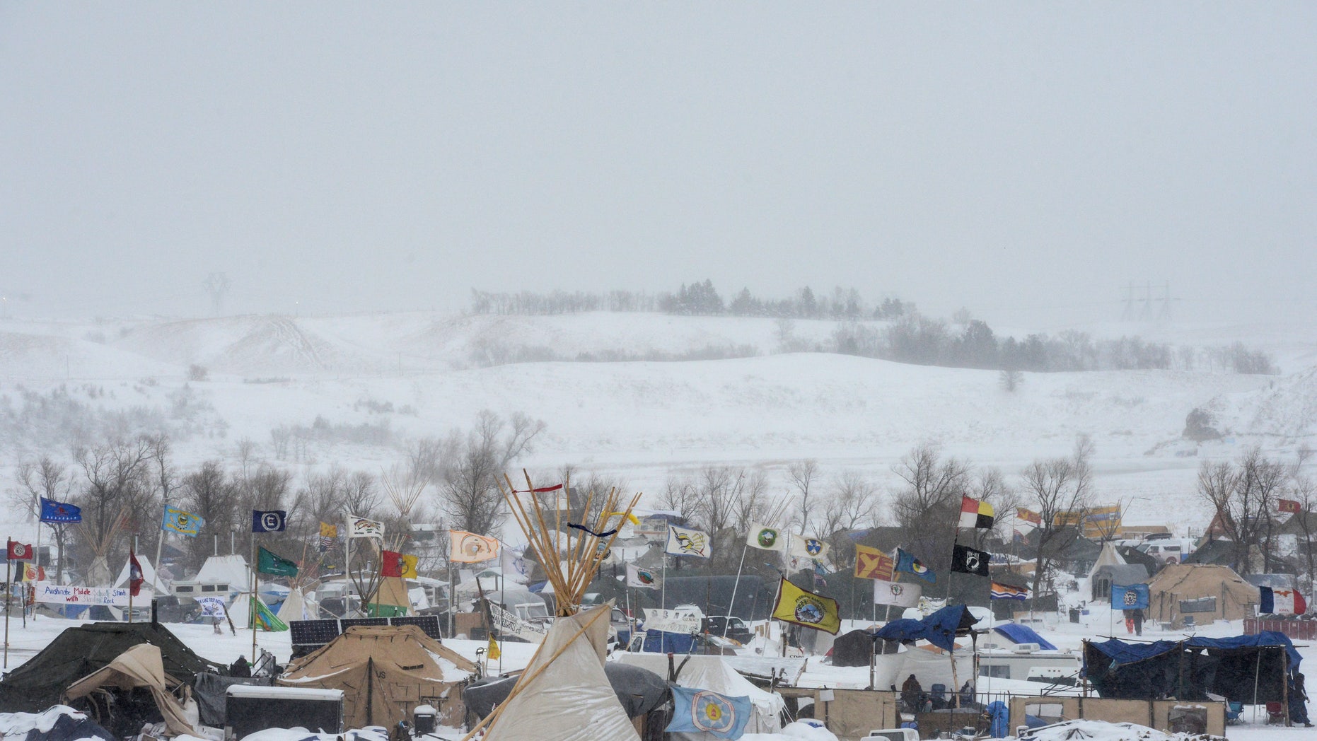 The Oceti Sakowin camp is seen in a snow storm during a protest against plans to pass the Dakota Access pipeline near the Standing Rock Indian Reservation, near Cannon Ball, North Dakota, U.S. November 29, 2016.