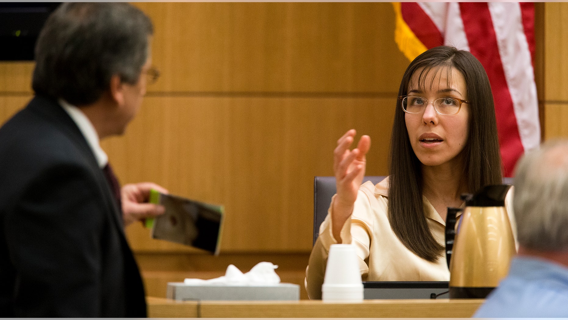 Feb. 26, 2013: Prosecutor Juan Martinez, left, cross examines Jodi Arias a during her trial in Maricopa County Superior Court.