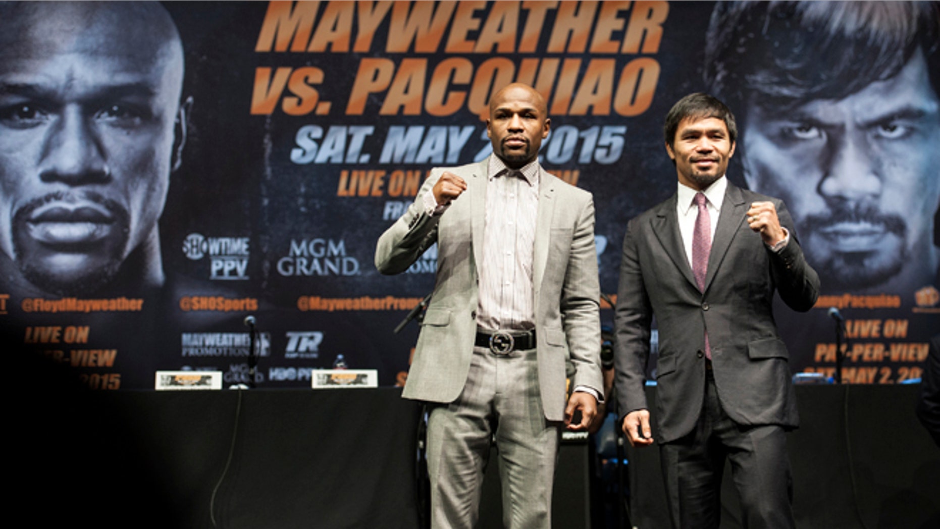 Mayweather and Pacquiao after a news conference Wednesday, March 11, 2015, in Los Angeles.