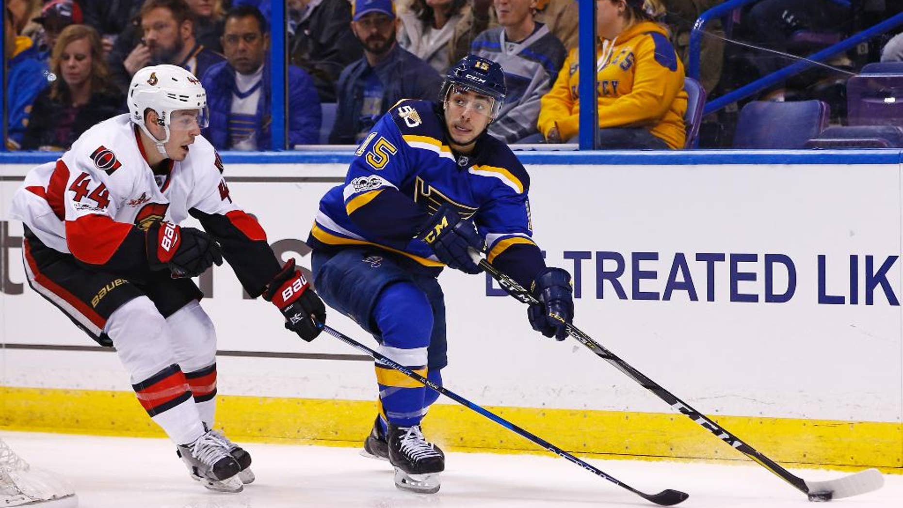 FILE - In this Jan. 17, 2017, file photo, St. Louis Blues' Robby Fabbri, right, looks to pass the puck as he is pressured by Ottawa Senators' Jean-Gabriel Pageau during the second period of an NHL hockey game in St. Louis. On Sunday, Feb. 5, 2017, the Blues announced Fabbri is out with an ACL injury for the rest of the season. (AP Photo/Billy Hurst, File)
