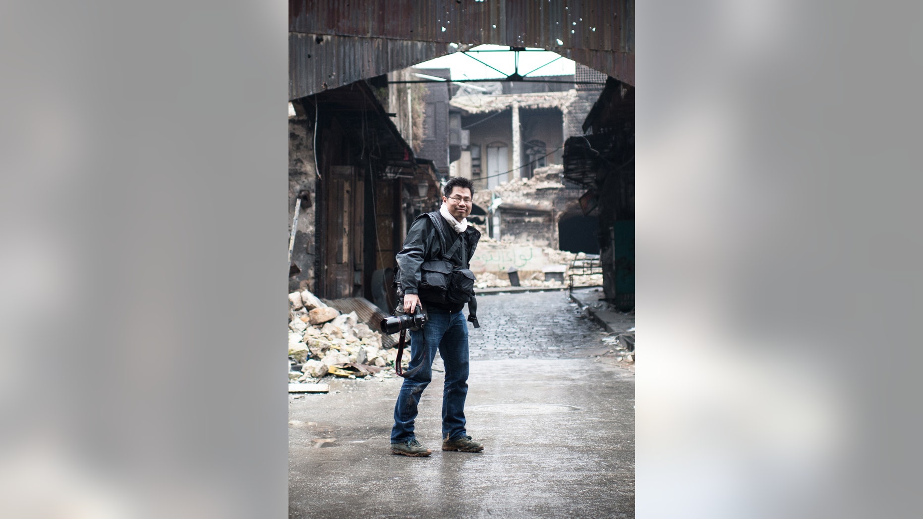 FILE- This Jan.5, 2013 file picture shows French freelance photographer Olivier Voisin at an undisclosed location in Syria . Olivier Voisin, who was seriously wounded in Syria last Thursday , died of his injuries in Turkey, France’s ministry of foreign affairs confirmed on Sunday Feb. 24, 2013. (AP Photo/Haytham Pictures, Edouard Elias, File)