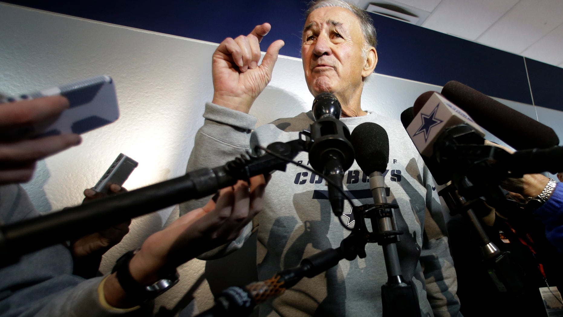 Dallas Cowboys defensive coordinator Monte Kiffin gestures as he responds to a question during an NFL football news conference at the Cowboys training facility Thursday, Feb. 14, 2013, in Irving, Texas. Kiffin is about to turn 73 and has been out of the NFL for five years. The Cowboys are thinking more about his history of success at Tampa Bay and how a switch to Kiffin's 4-3 alignment will translate into fewer mistakes and more turnovers. (AP Photo/Tony Gutierrez)