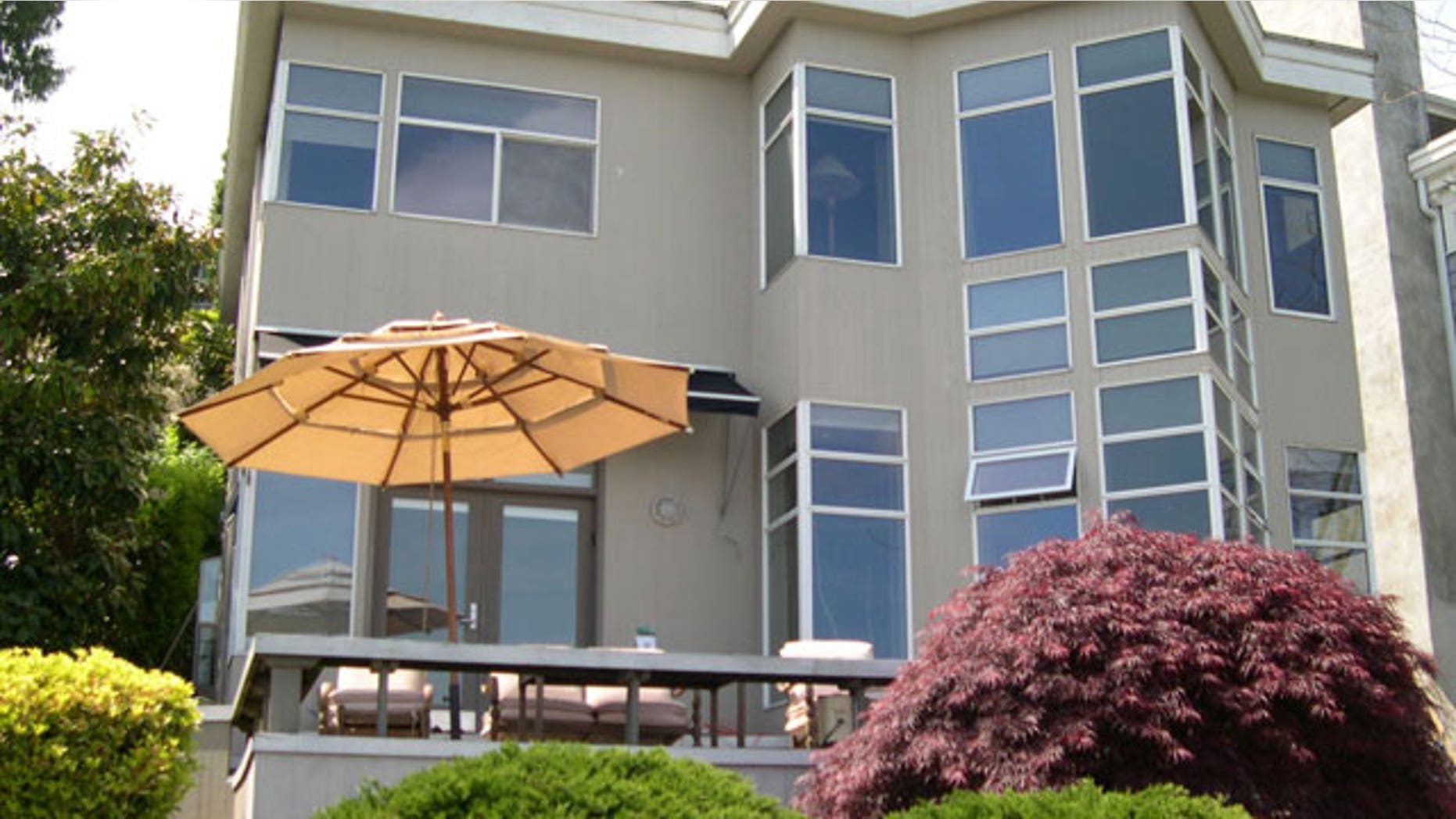 In this undated photo provided by the King County Dept. of Assessments, the $1.2 million waterfront home where prosecutors say a Seattle chiropractor and his wife lived while claiming welfare assistance is seen.