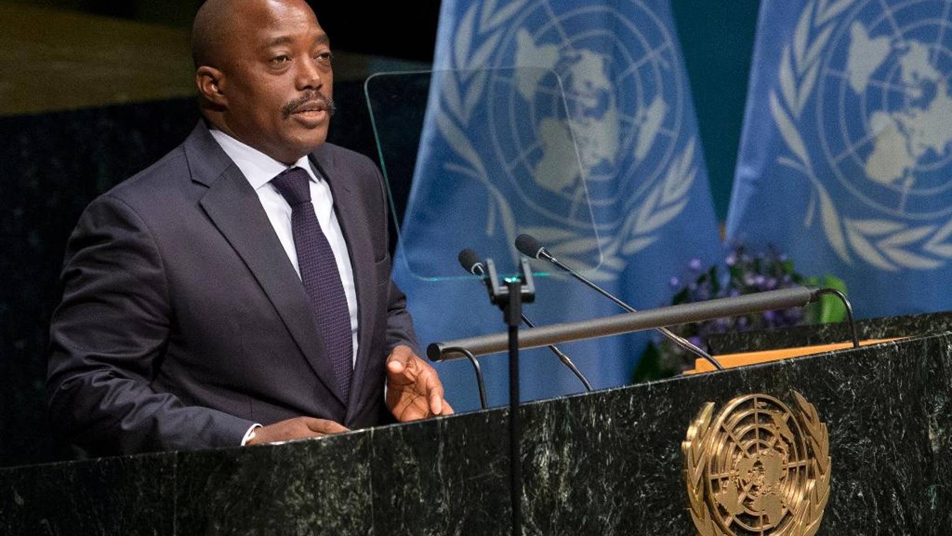 FILE - In this file photo dated Friday, April 22, 2016, Congolese President Joseph Kabila speaks Friday, April 22, 2016 at U.N. headquarters. Longtime incumbent Kabila is constitutionally barred from seeking another term in office, but Congo's top opposition candidate for the upcoming presidential election Moise Katumbi flew to South Africa for medical treatment Friday May, 20, 2016, one day after authorities issued an arrest warrant for him. (AP Photo/Mary Altaffer, FILE)