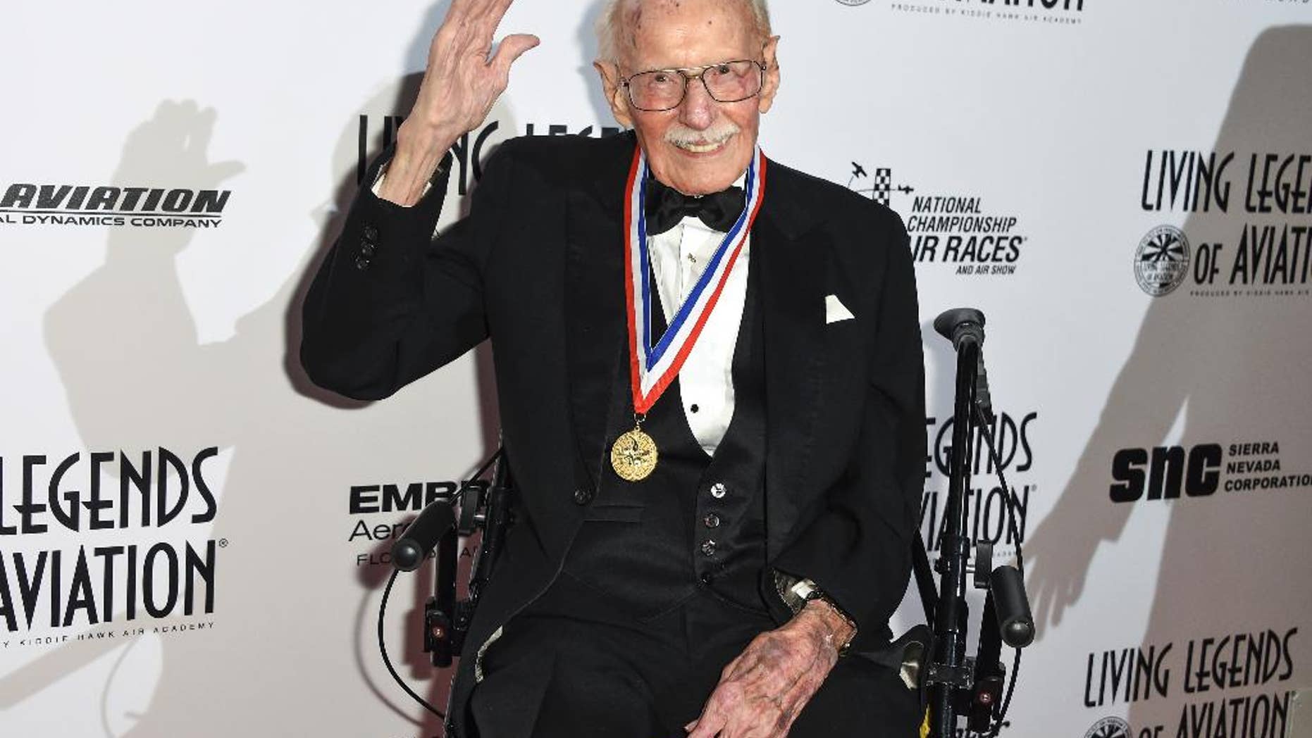 FILE - In this Jan. 16, 2015, file photo, Bob Hoover attends the 12th annual Living Legends of Aviation Awards at The Beverly Hilton Hotel in Beverly Hills, Calif. Robert A. "Bob" Hoover, a World War II fighter pilot who became an aviation legend for his skills in testing aircraft and demonstrating their capabilities in air shows, has died at age 94. Bill Fanning, a close family friend and a fellow pilot, says Hoover died early Tuesday, Oct. 25, 2016, in Southern California. (Photo by Rob Latour/Invision/AP, File)