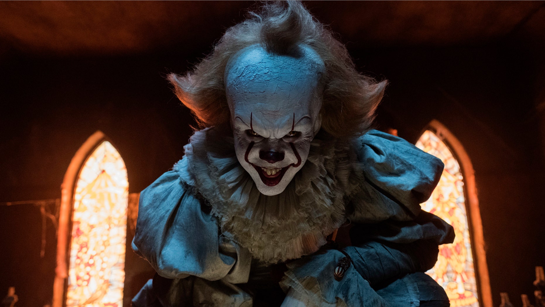 Bill Skarsgard stars as Pennywise the clown in "It," a new horror film based on a Stephen King novel.