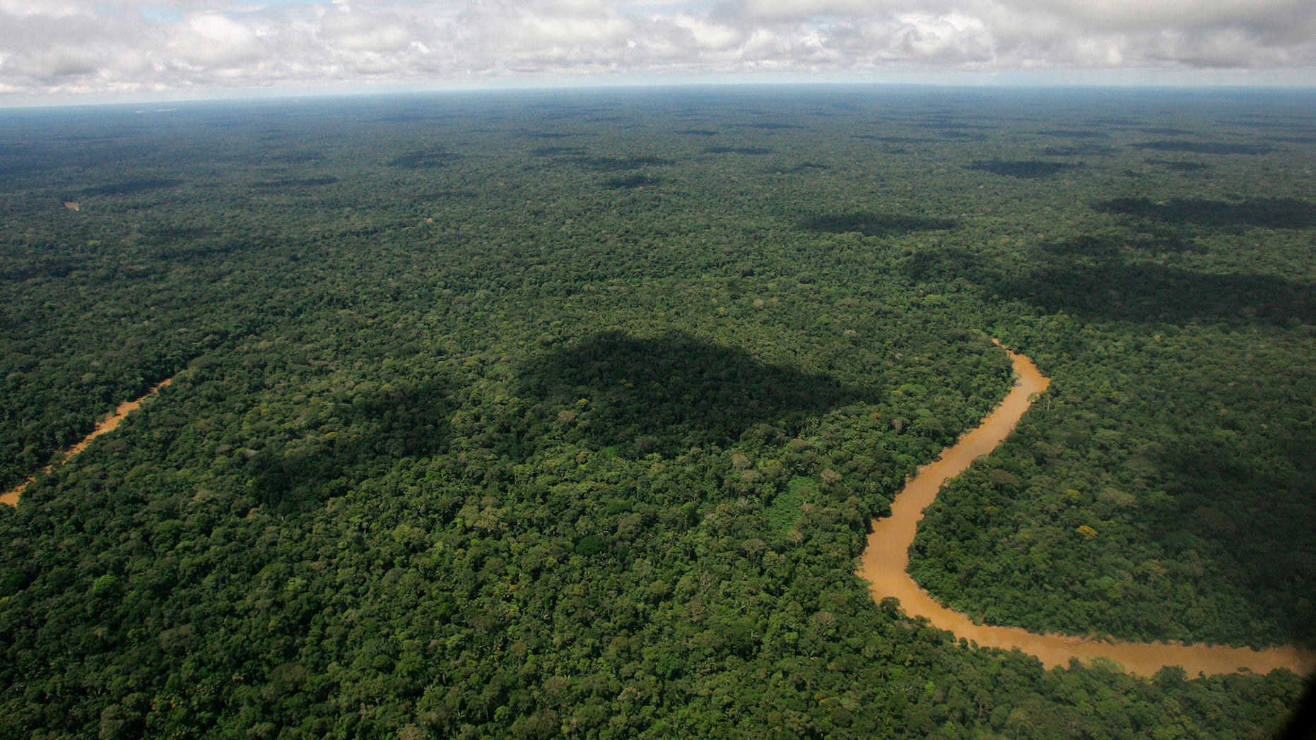 FILE - This May 17, 2007 file photo shows an aerial view of Yasuni National Park in Ecuador's northeastern jungle. Lawmakers on Thursday, Oct. 3, 2013 authorized the extraction of oil from Yasuni National Park, a pristine Amazon reserve. (AP Photo/Dolores Ochoa, File)