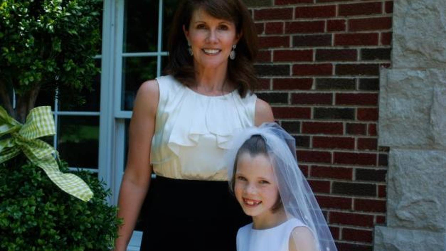 In this undated photo obtained by Fox affiliate KTVI, Cathy Murch is seen with her daughter. Murch and her two children were found dead inside their suburban St. Louis home Monday in what police suspect was a murder-suicide.