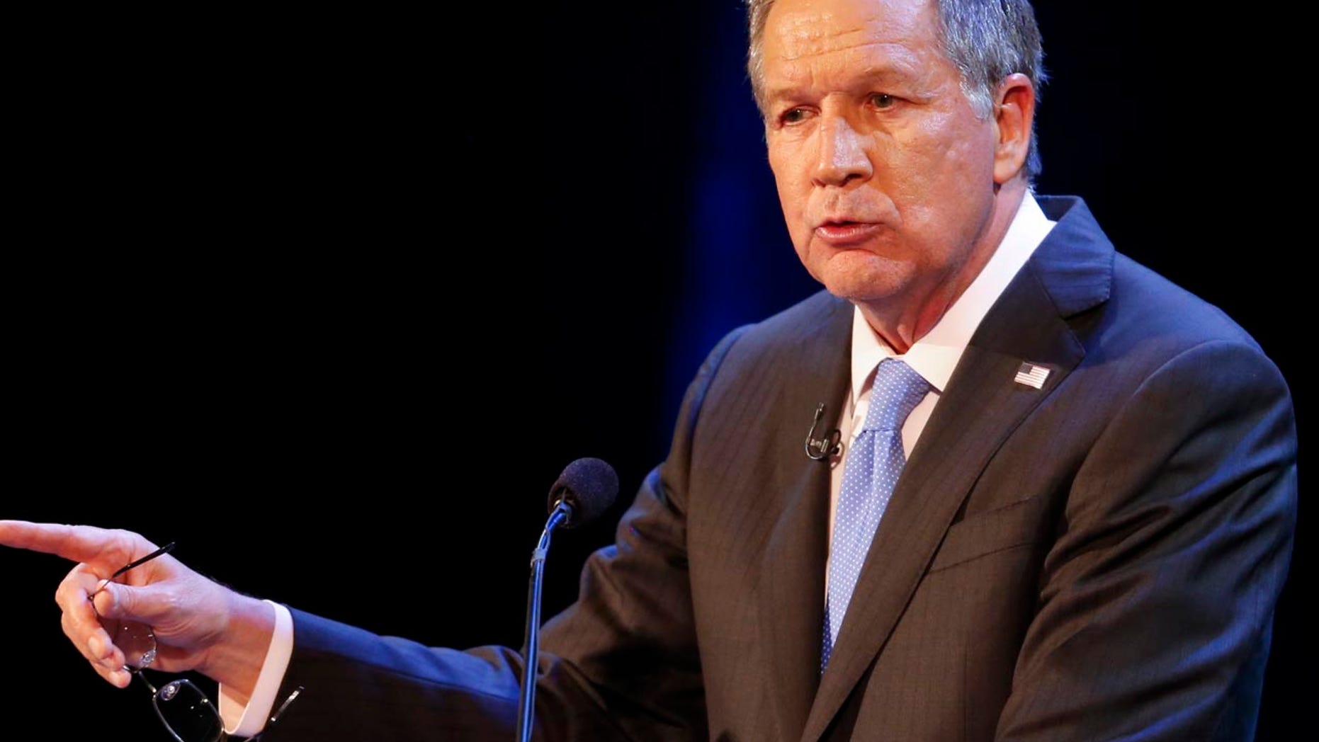 FILE - In this April 4, 2017 file photo, Ohio Gov. John Kasich speaks in Sandusky, Ohio. Kasich is joining friend and ex-California Gov. Arnold Schwarzenegger in his effort to overhaul partisan political map-making that's helped fuel their Republican party's rise to power. Kasich said Tuesday, Sept. 5, 2017, he's signed a legal brief that opposes the GOP in the momentous redistricting case being heard by the U.S. Supreme Court this fall. He says other signers include Republicans John McCain and Bob Dole. (AP Photo/Ron Schwane, File)