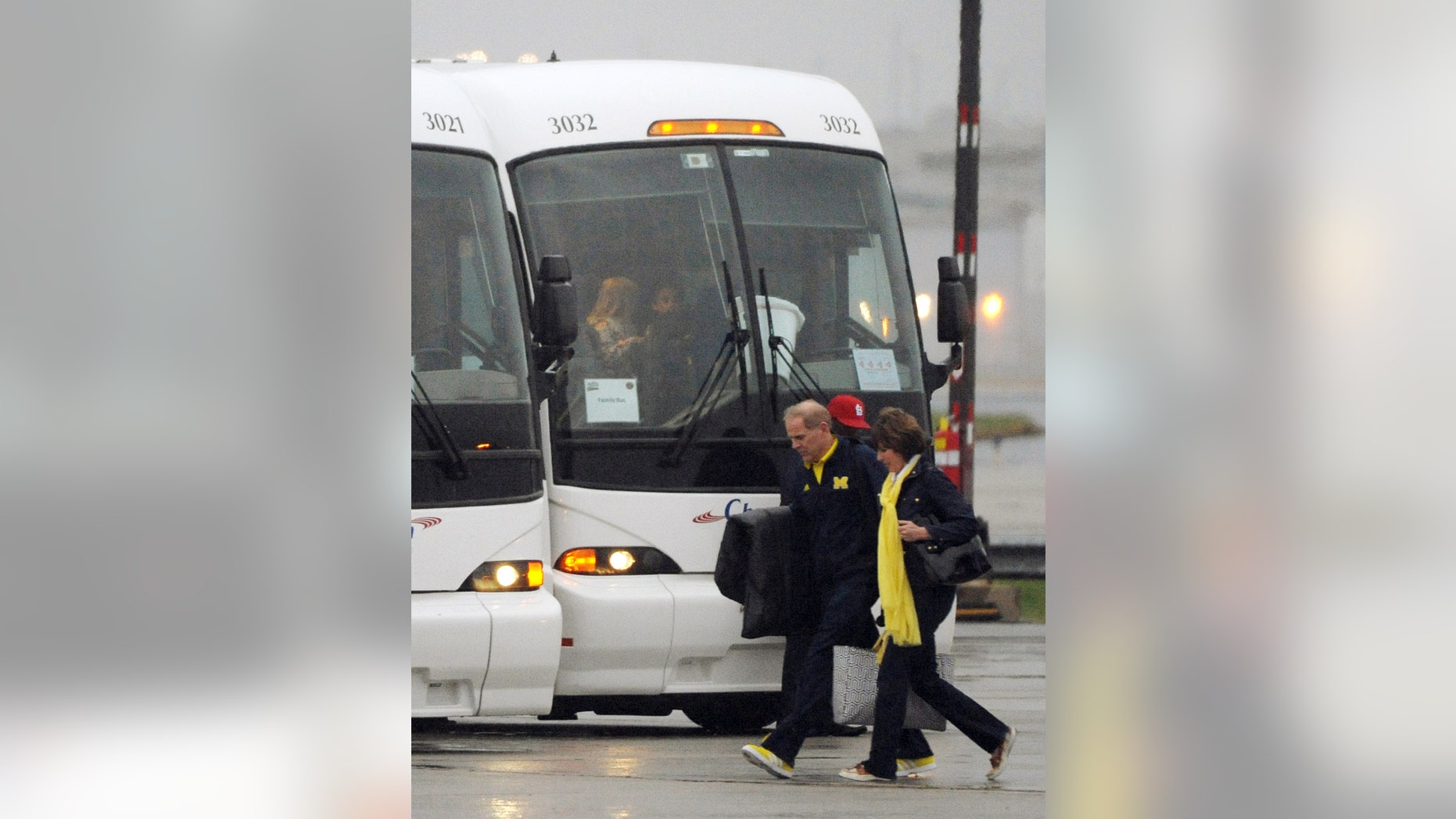 Michigan head coach John Beilein arrives with the team, Wednesday, April 3, 2013, for their NCAA Final Four college basketball tournament game against Syracuse on Saturday in Atlanta. (AP Photo/David Tulis)