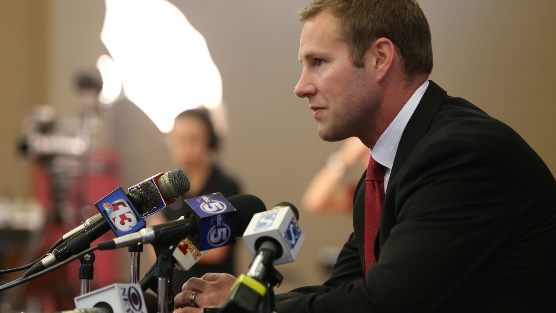 Iowa State coach Fred Hoiberg takes questions from the media during NCAA college basketball media day at the Sukup Basketball Complex in Ames, Iowa on Thursday, Oct. 10, 2013. (AP Photo/The Des Moines Register, Charlie Litchfield) NO SALES