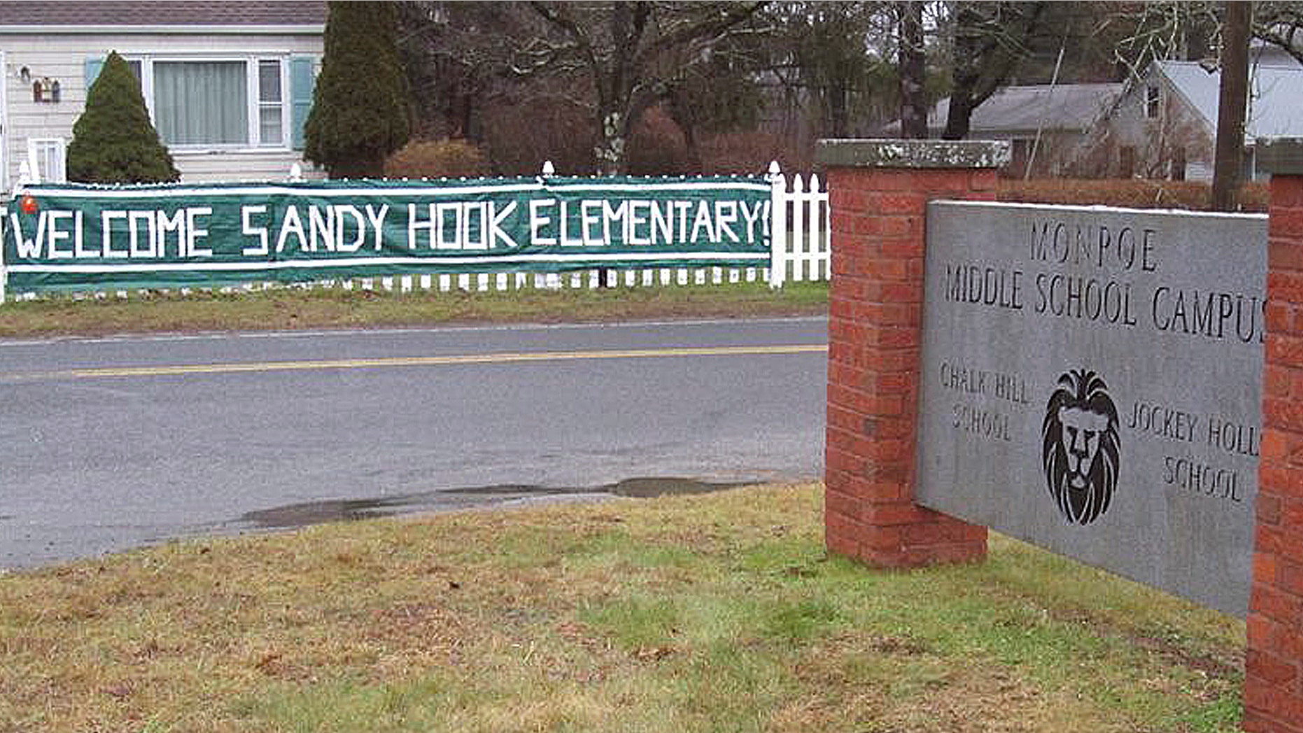 This December 2012 photo provided by The Newtown Bee shows a sign welcoming Sandy Hook Elementary School students, of Newtown, Conn., to the Chalk Hill School campus in neighboring Monroe, Conn. An open house was planned for the Sandy Hook students Wednesday, Jan. 2, 2013 at the former Chalk Hill School, overhauled specially for them. Classes for the Sandy Hook students start there on Thursday. (AP Photo/The Newtown Bee, Andy Hutchison)