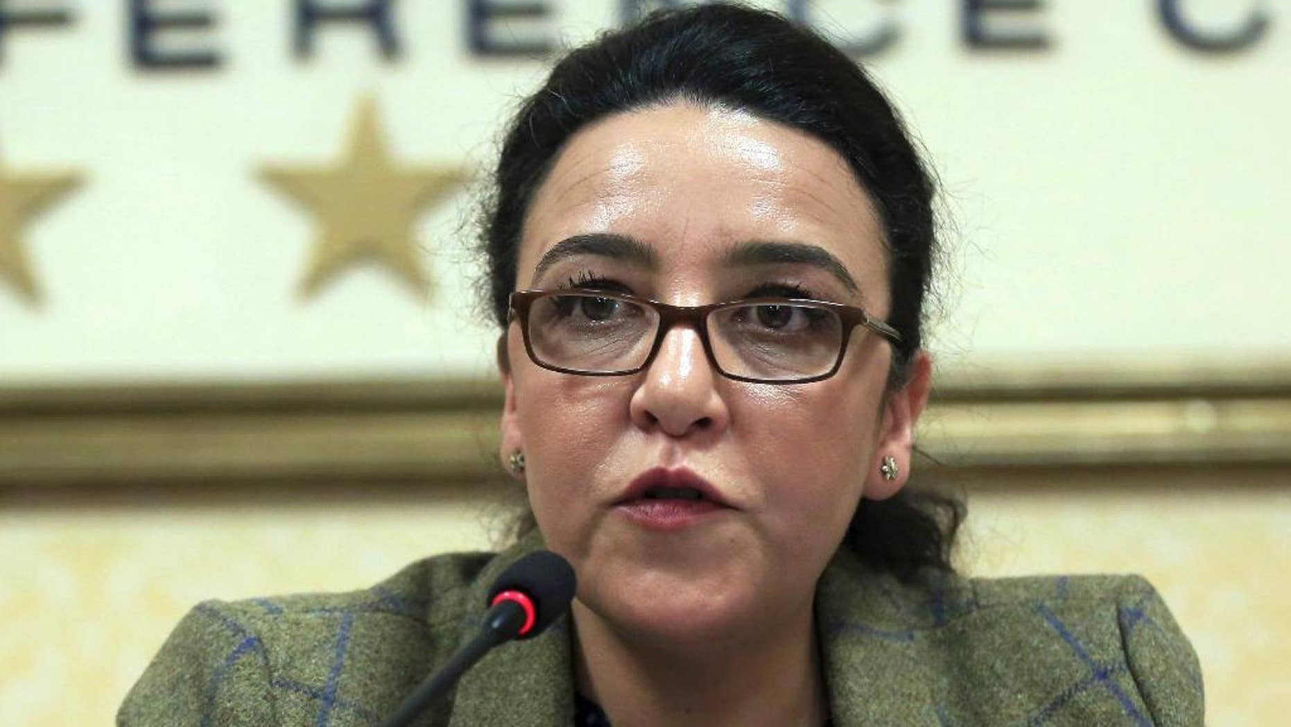 Houria Es-Slami, head of the United Nations Working Group of the Enforced or Involuntary Disappearances, speaks during a news conference in Tirana, Monday, Dec. 12, 2016. U.N. human rights officials have called on Albanian authorities to provide more reparations to families of around 6,000 people who disappeared during the former communist regime. (AP Photo Hektor Pustina)