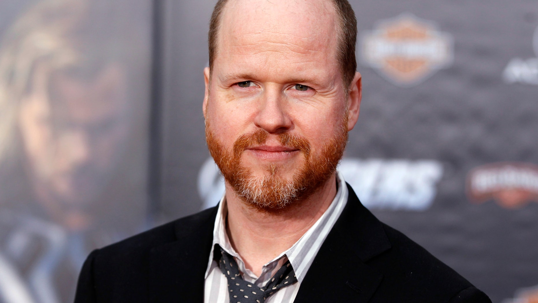 Director Joss Whedon poses at the world premiere of the film "Marvel's The Avengers" in Hollywood, California April 11, 2012.