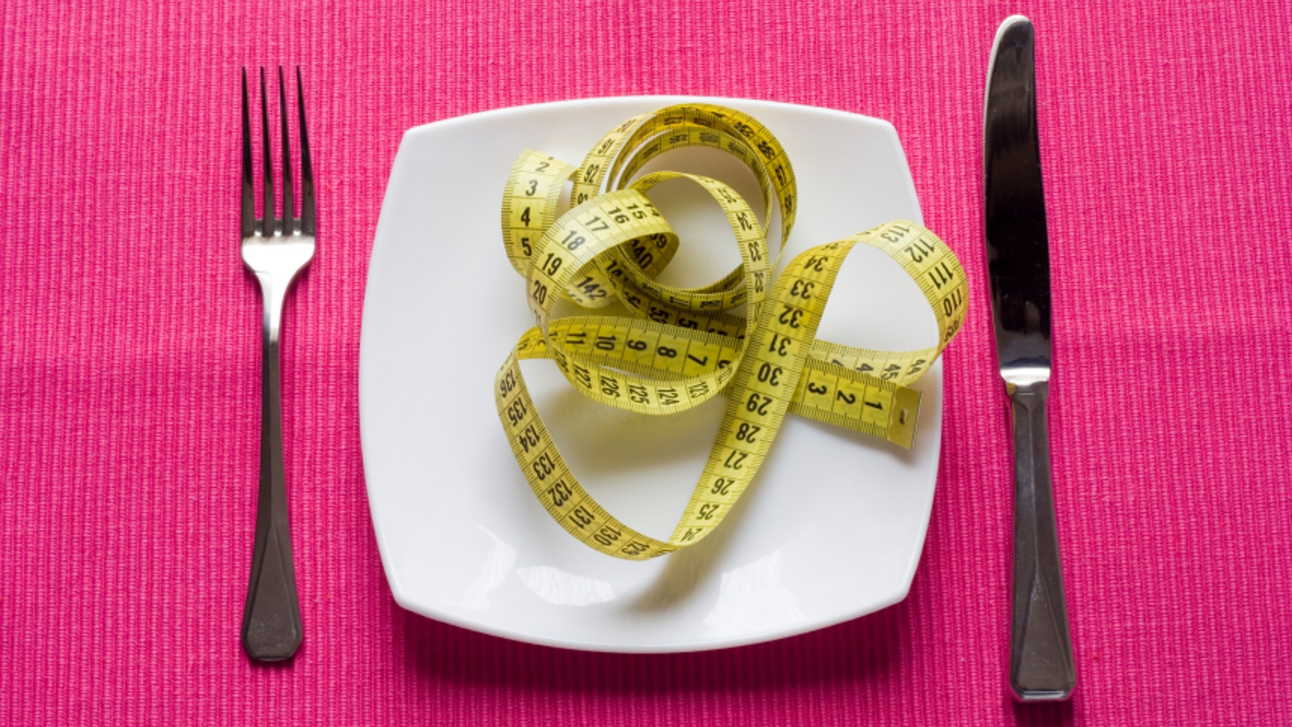 healthy eating concept in a pink background