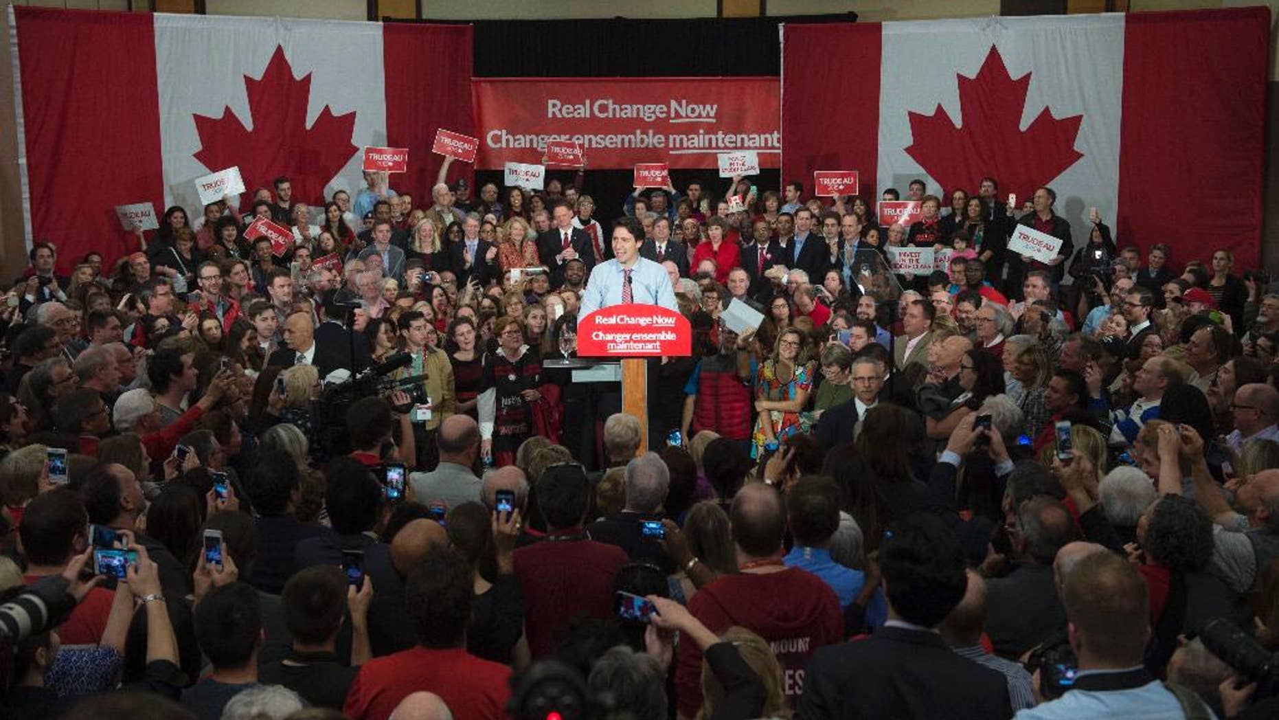 Justin Trudeau speaks to supporters at a welcome rally in Ottawa, Tuesday, Oct. 20, 2015. Trudeau, the son of late Prime Minister Pierre Trudeau, became Canada’s new prime minister after beating Conservative Stephen Harper. (Adrian Wyld/The Canadian Press via AP) MANDATORY CREDIT