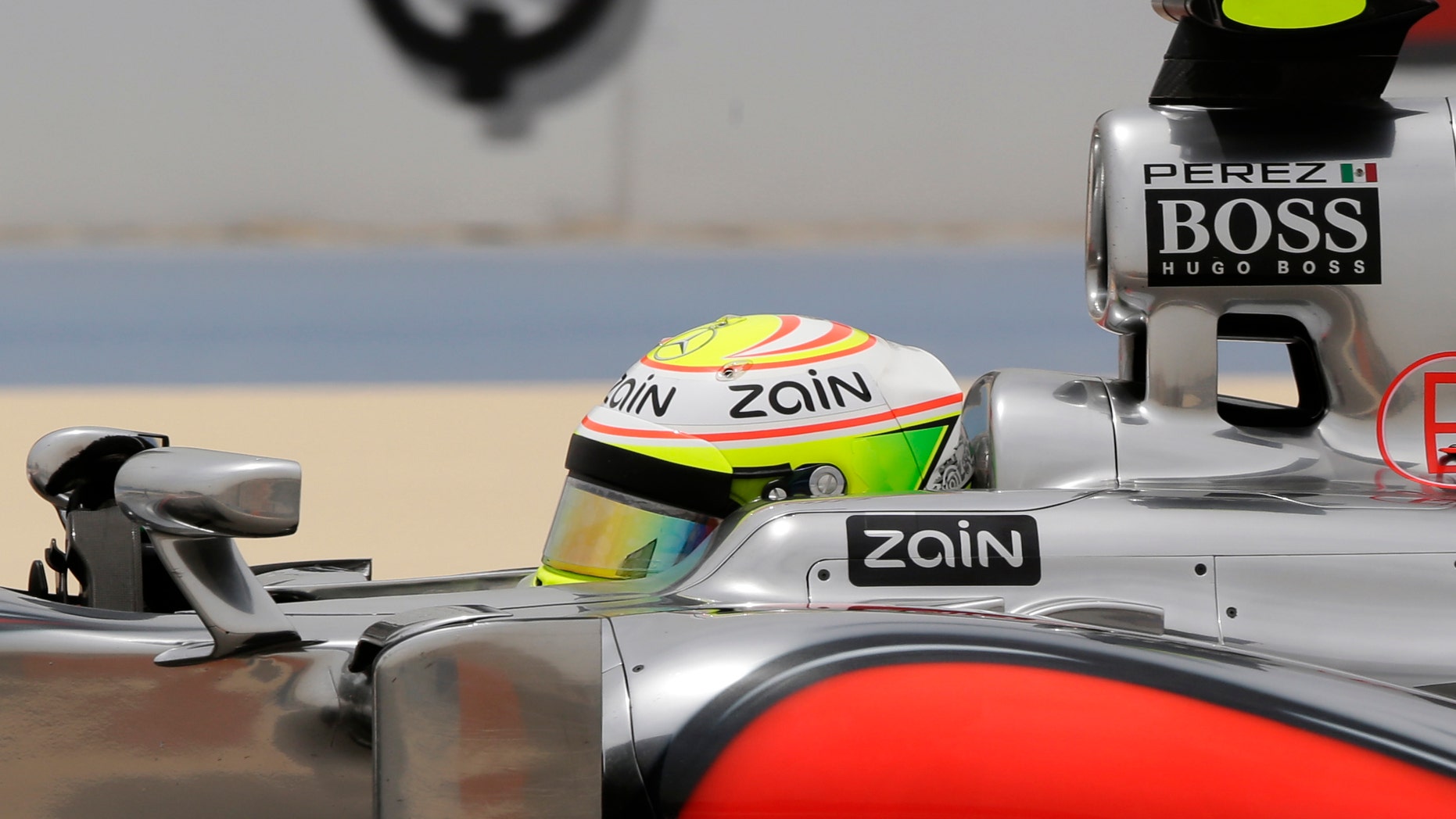 Mercedes driver Lewis Hamilton of Britain drives his car during the third free practice ahead the Bahrain Formula One Grand Prix at the Formula One Bahrain International Circuit, in Sakhir, Bahrain, Saturday, April 20, 2013. The Bahrain Formula One Grand Prix will take place on Sunday. (AP Photo/Hassan Ammar)