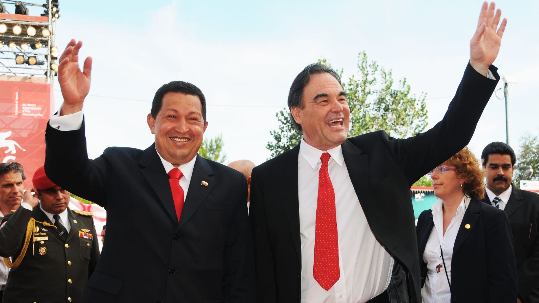 Venezuela's late President Hugo Chavez and director Oliver Stone during the Venice Film Festival on September 7, 2009 in Venice, Italy.